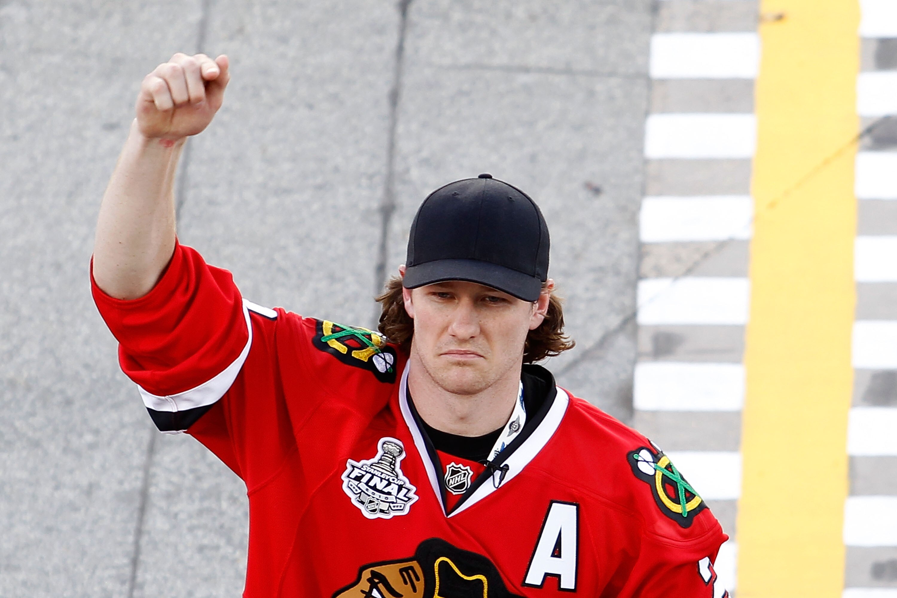 JOLIET, IL - JULY 10:  Duncan Keith of the NHL's Chicago Blackhawks gives the command for the drivers to start their engines during the NASCAR Sprint Cup Series LIFELOCK.COM 400 at the Chicagoland Speedway on July 10, 2010 in Joliet, Illinois.  (Photo by 