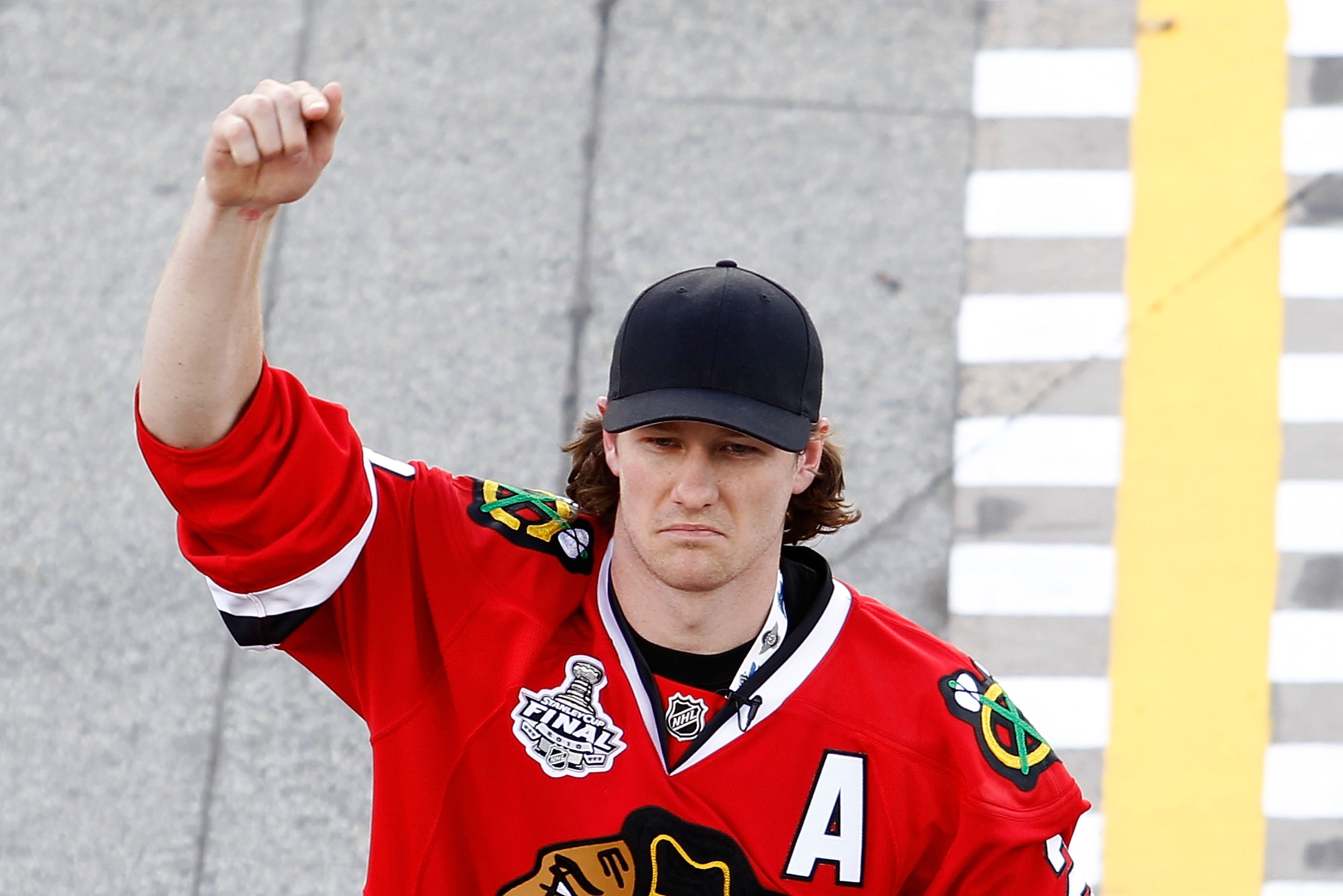 JOLIET, IL - JULY 10: Duncan Keith of the NHL's Chicago Blackhawks gives the command for the drivers to start their engines during the NASCAR Sprint Cup Series LIFELOCK.COM 400 at the Chicagoland Speedway on July 10, 2010 in Joliet, Illinois. (Photo by JOLIET, IL - JULY 10: Duncan Keith of the NHL's Chicago Blackhawks gives the command for the drivers to start their engines during the NASCAR Sprint Cup Series LIFELOCK.COM 400 at the Chicagoland Speedway on July 10, 2010 in Joliet, Illinois. (Photo by