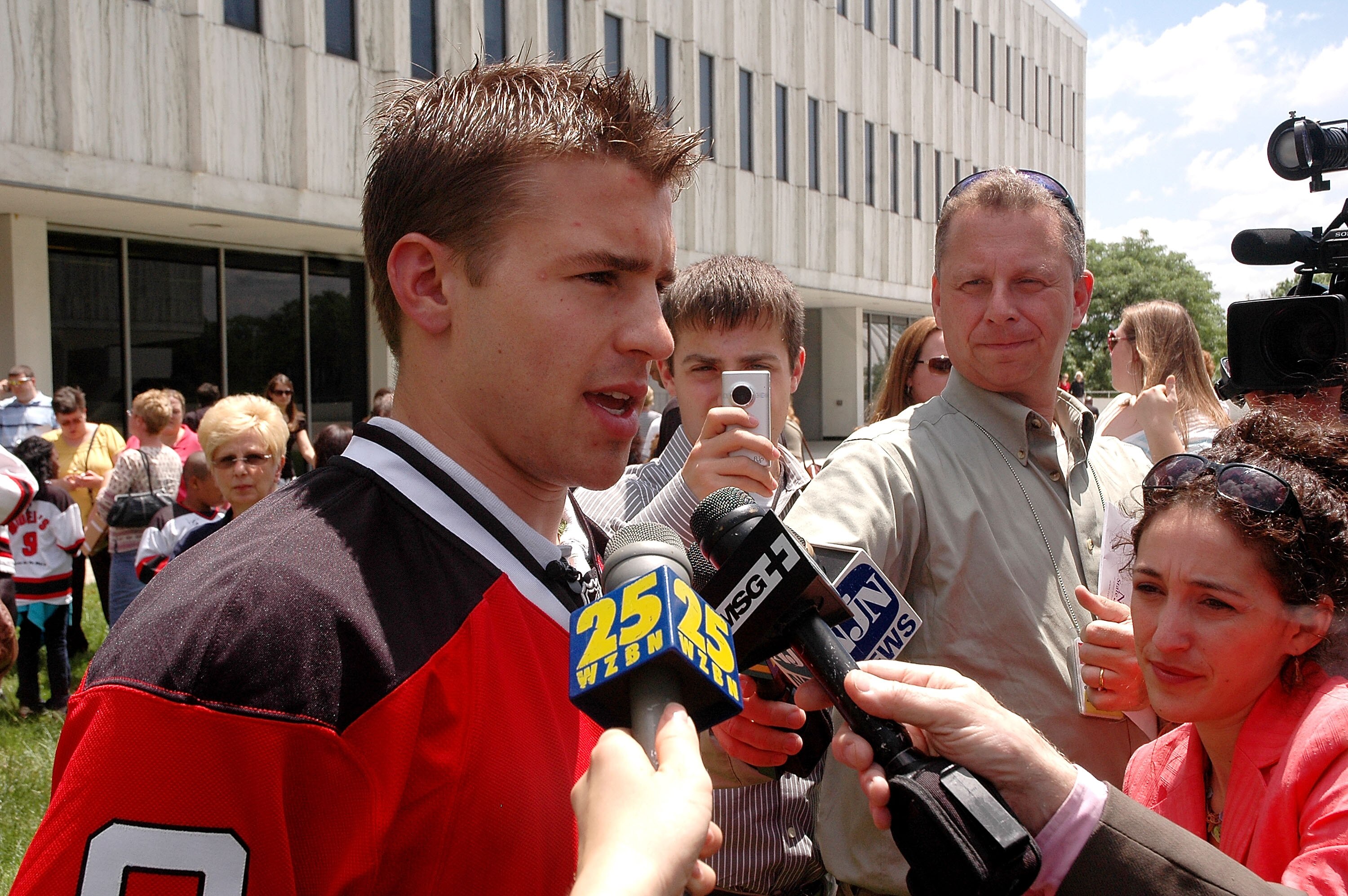 TRENTON, NJ - MAY 25: New Jersey Devils forward Zach Parise is interviewed by the media during Zach Parise Reads to Students at the State Library on May 25, 2010 in Trenton, New Jersey. (Photo by Andy Marlin/Getty Images for the New Jersey Devils)