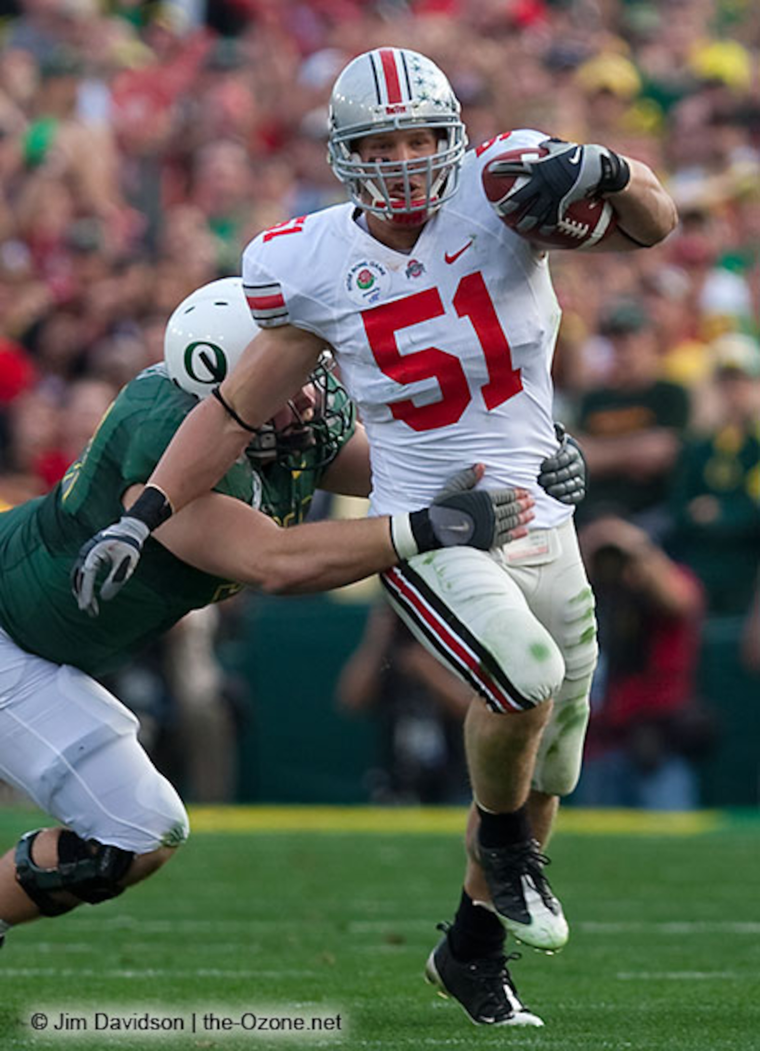 Ross Homan returns an interception during the 2010 Rose Bowl