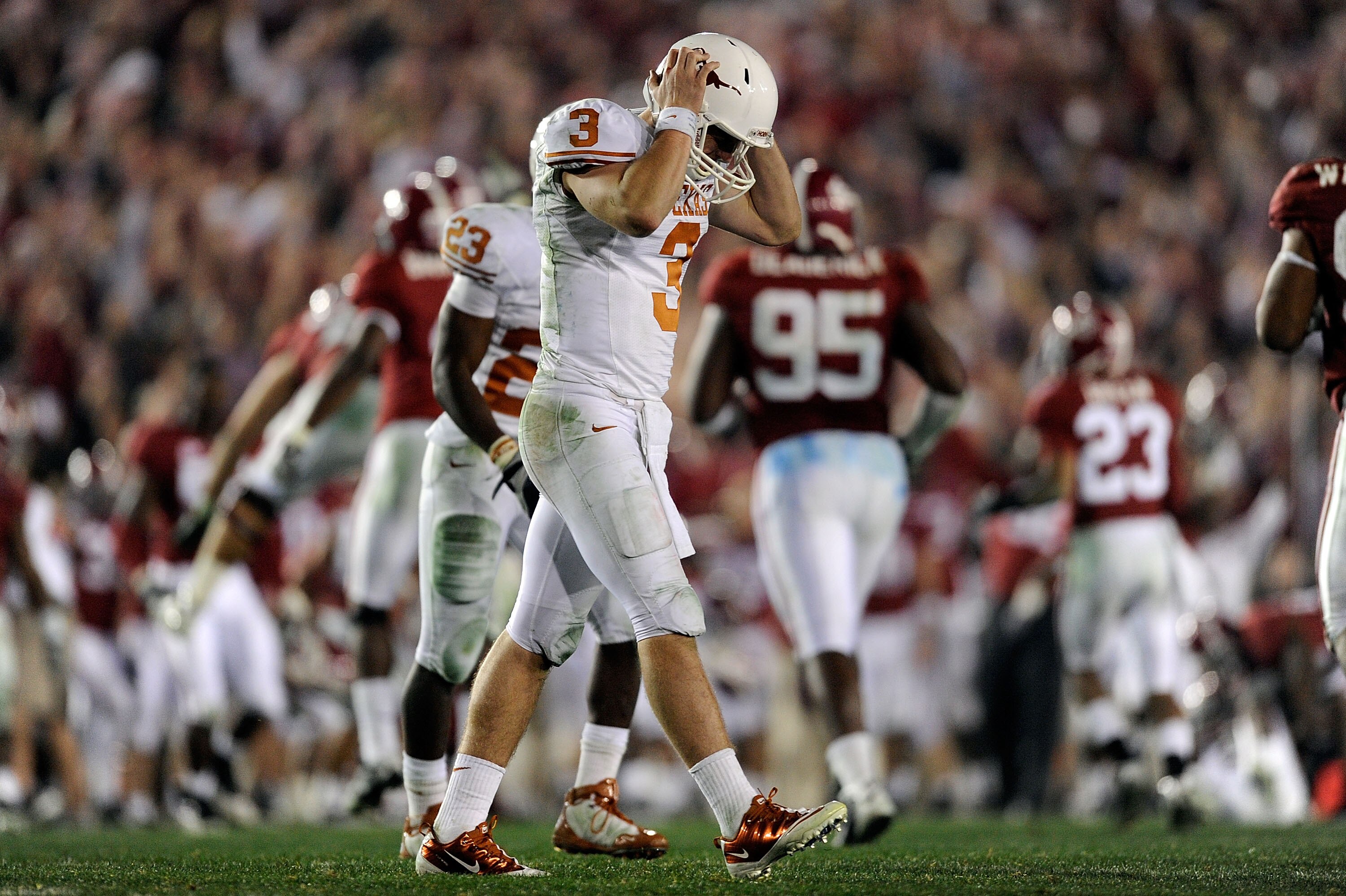 PASADENA, CA - JANUARY 07:  Quarterback Garrett Gilbert #3 of the Texas Longhorns reacts after throwing an interception to the Alabama Crimson Tide during the Citi BCS National Championship game at the Rose Bowl on January 7, 2010 in Pasadena, California.