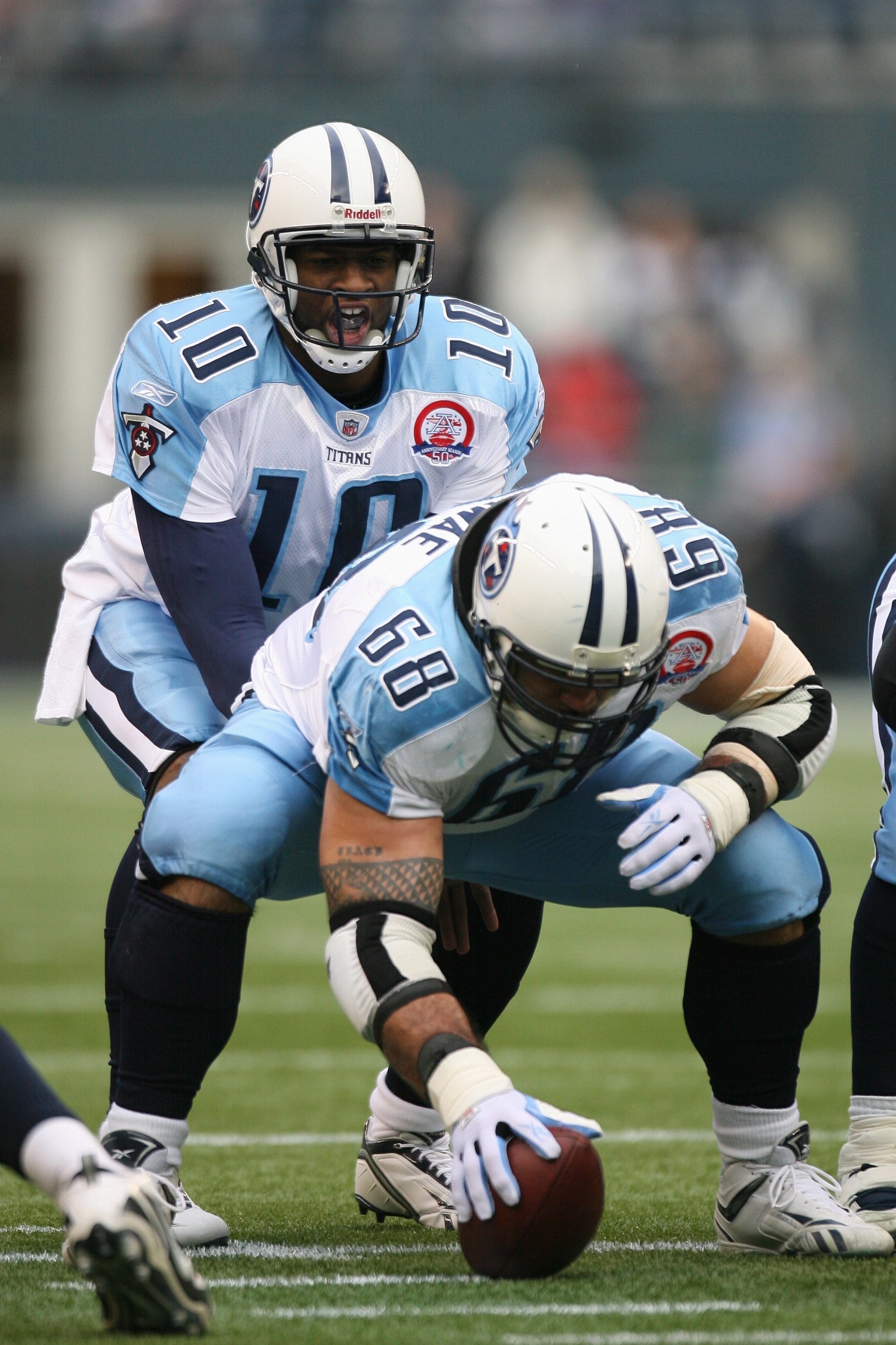 SEATTLE - JANUARY 03:  Vince Young #10 of the Tennessee Titans stands under center Kevin Mawae #68 during the game against the Seattle Seahawks on January 3, 2010 at Qwest Field in Seattle, Washington. (Photo by Otto Greule Jr/Getty Images)