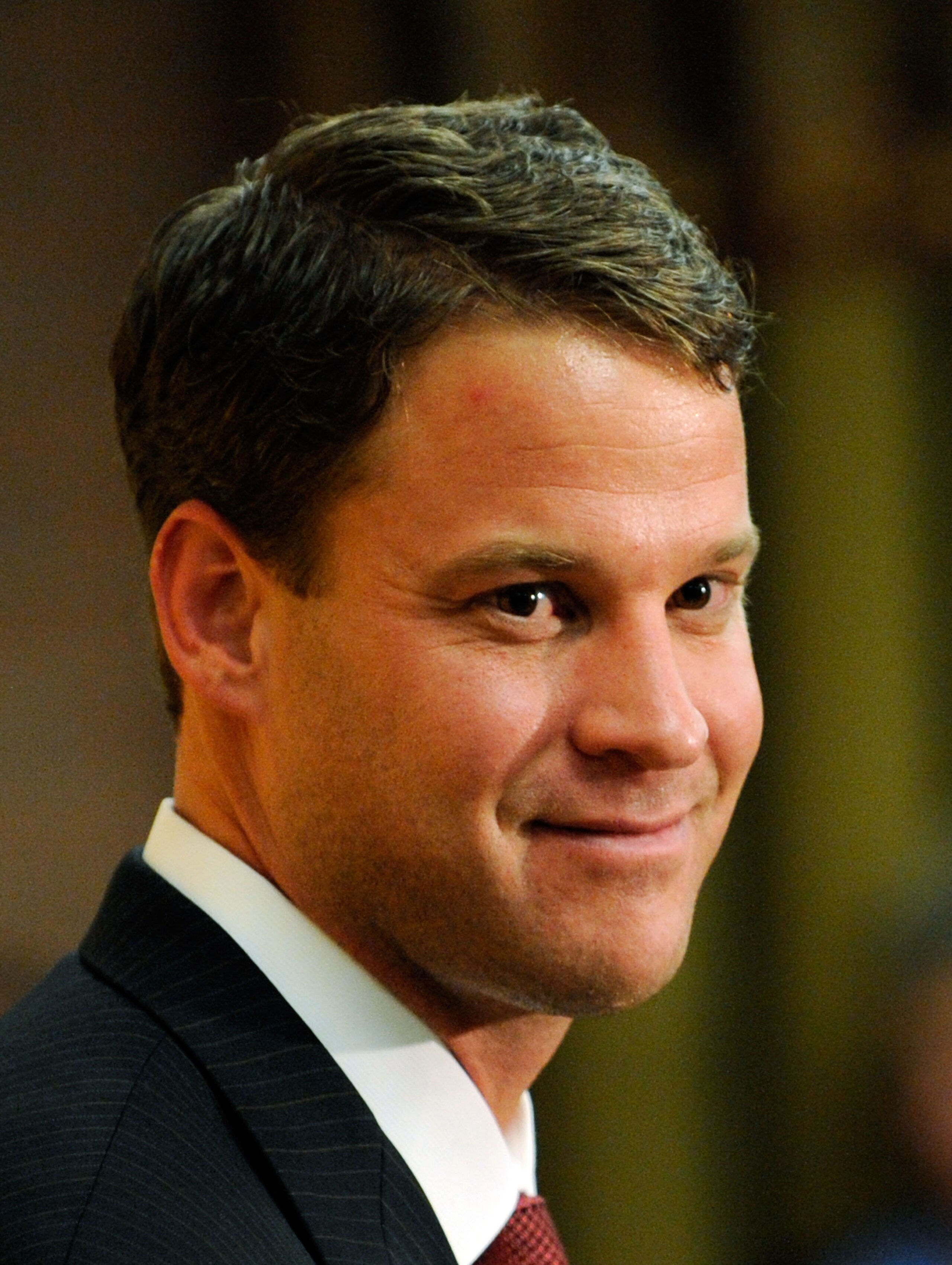 LOS ANGELES, CA - JANUARY 13:  Lane Kiffin (L)  the new college football coach of University of Southern California speaks during a news conference at Heritage Hall on the campus of USC on January 13, 2010 in Los Angeles, California.  (Photo by Kevork Dja