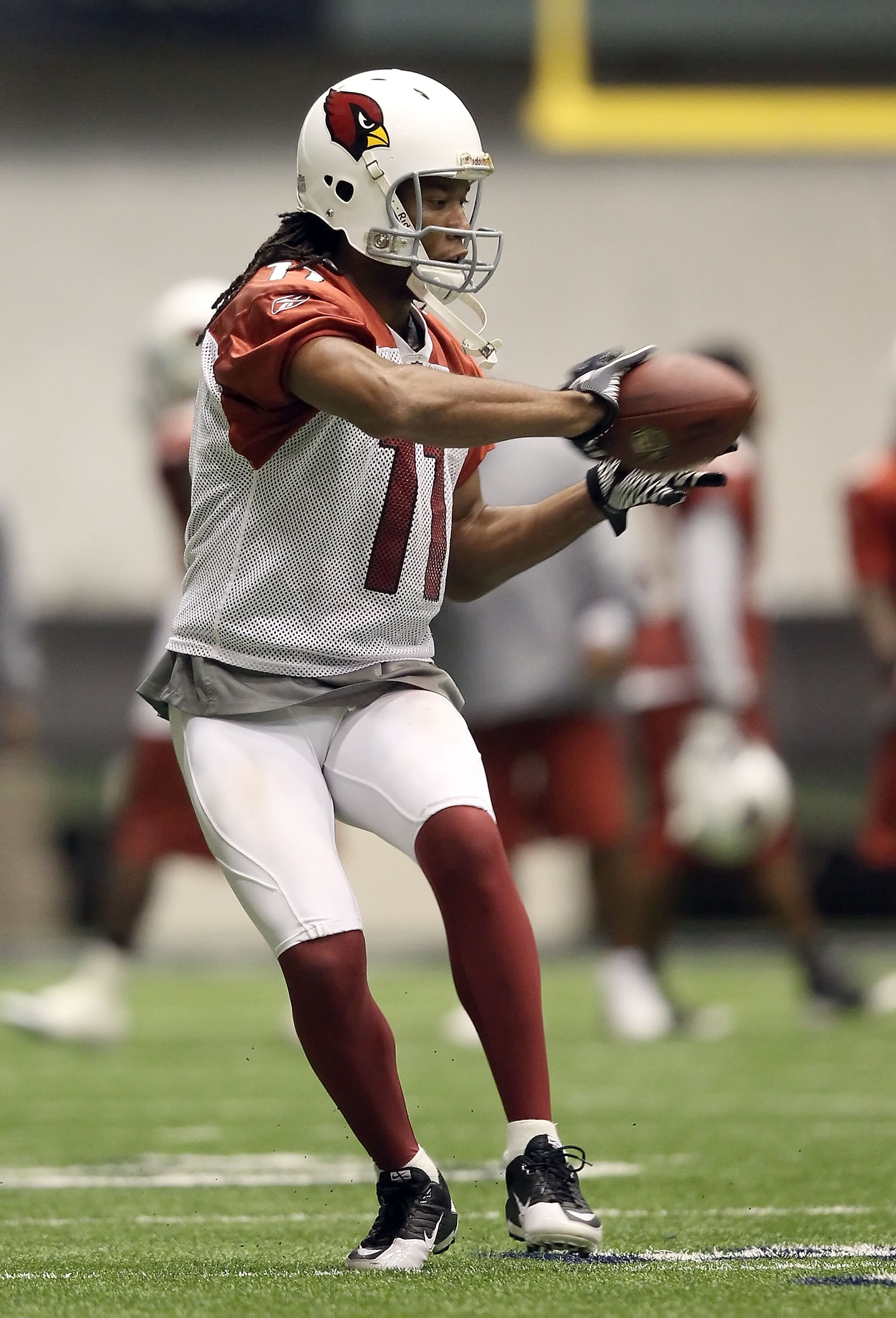FLAGSTAFF, AZ - AUGUST 02:  Wide receiver Larry Fitzgerald #11 of the Arizona Cardinals practices in the team training camp at Northern Arizona University Walkup Skydome on August 2, 2010 in Flagstaff, Arizona.  (Photo by Christian Petersen/Getty Images)