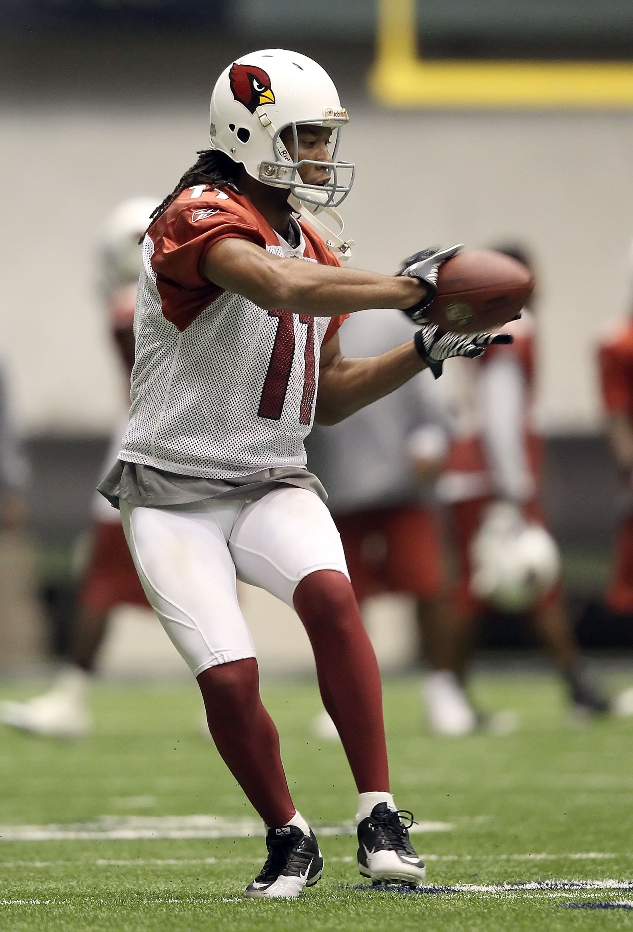 FLAGSTAFF, AZ - AUGUST 02: Wide receiver Larry Fitzgerald #11 of the Arizona Cardinals practices in the team training camp at Northern Arizona University Walkup Skydome on August 2, 2010 in Flagstaff, Arizona. (Photo by Christian Petersen/Getty Images) FLAGSTAFF, AZ - AUGUST 02: Wide receiver Larry Fitzgerald #11 of the Arizona Cardinals practices in the team training camp at Northern Arizona University Walkup Skydome on August 2, 2010 in Flagstaff, Arizona. (Photo by Christian Petersen/Getty Images)