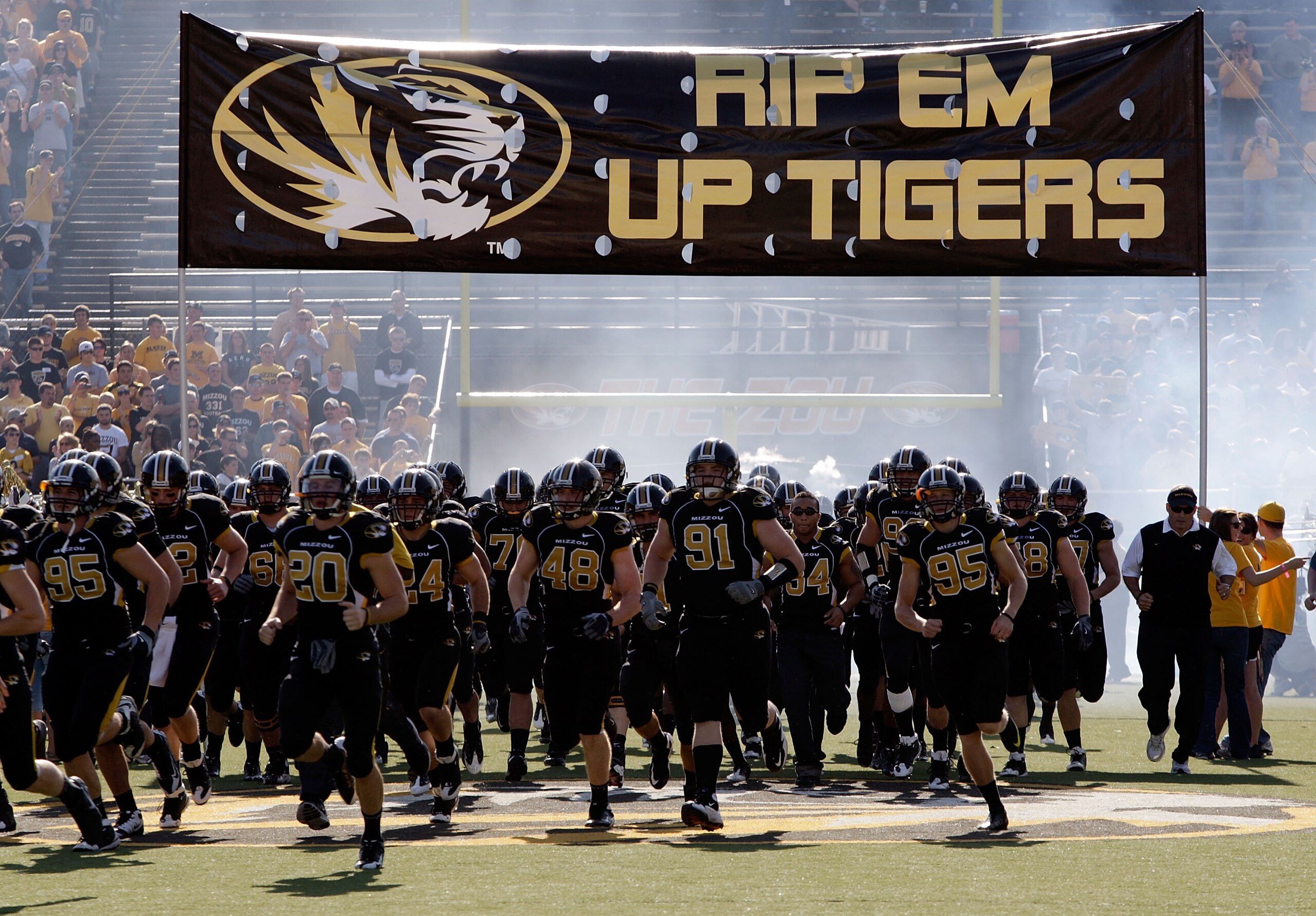 COLUMBIA, MO - NOVEMBER 07:  The Missouri Tigers run onto the field prior to the start of the game against the Baylor Bears at Faurot Field at Memorial Stadium on November 7, 2009 in Columbia, Missouri.  (Photo by Jamie Squire/Getty Images)