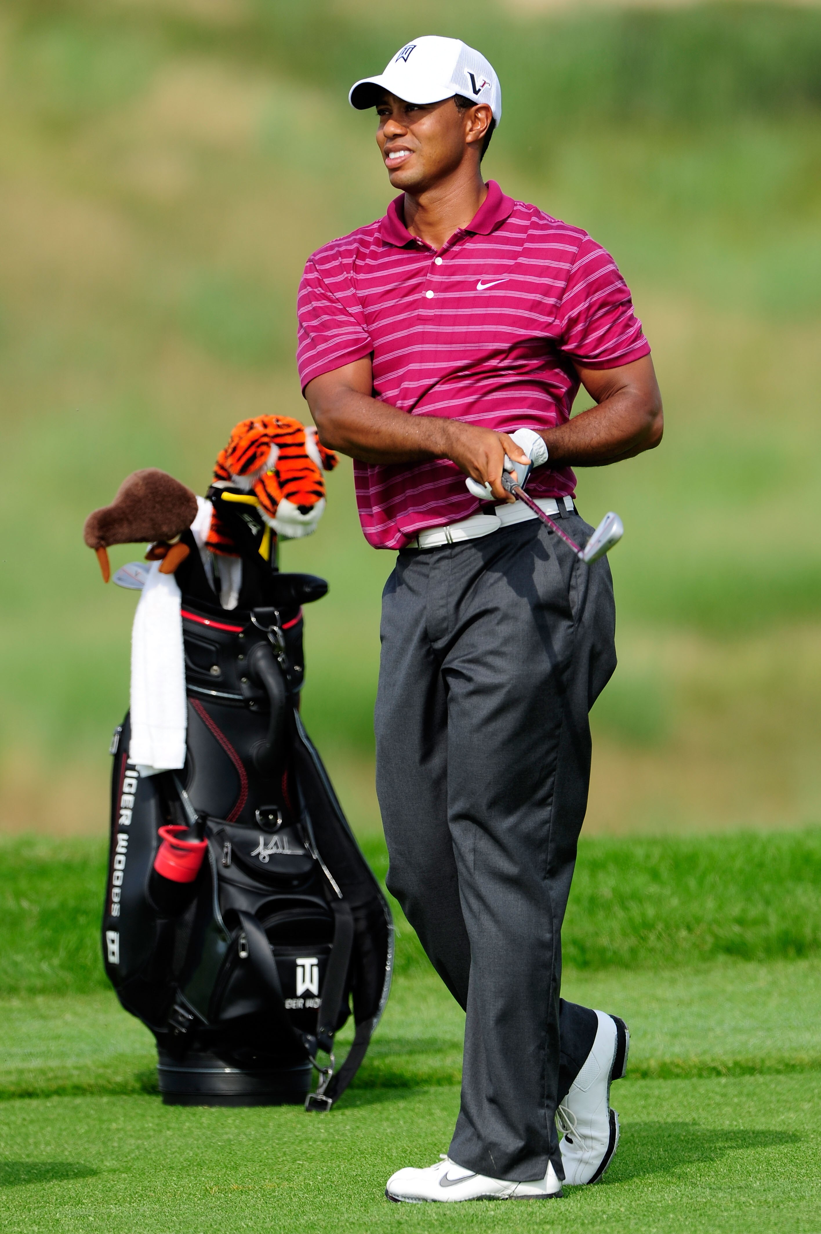 KOHLER, WI - AUGUST 10:  Tiger Woods watches his shot during a practice round prior to the start of the 92nd PGA Championship on the Straits Course at Whistling Straits on August 10, 2010 in Kohler, Wisconsin.  (Photo by Stuart Franklin/Getty Images)