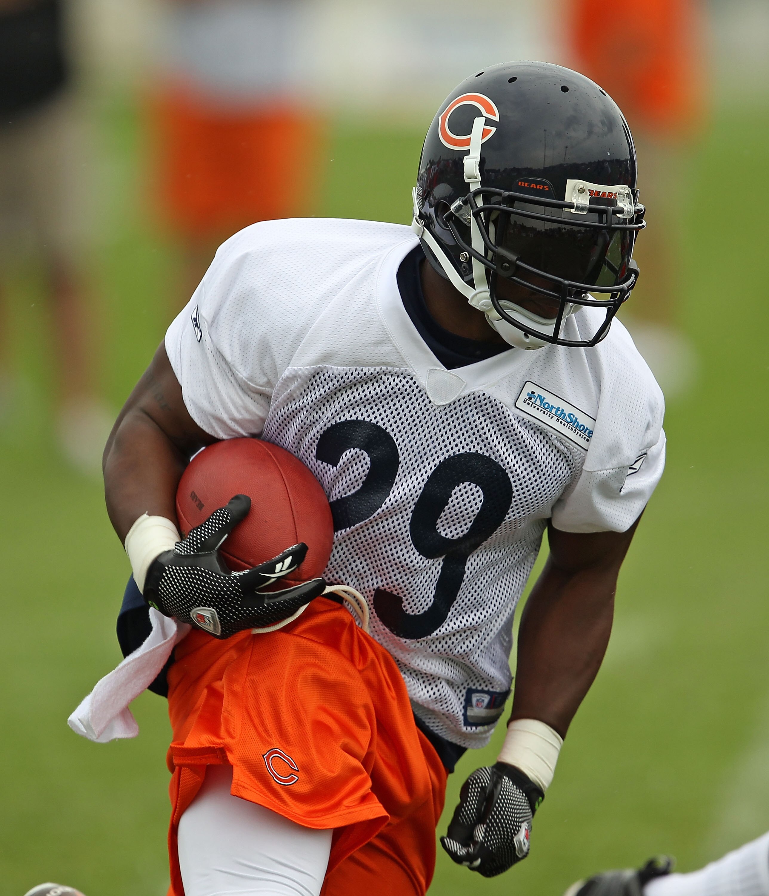 BOURBONNAIS, IL - JULY 30: Chester Taylor #29 of the Chicago Bears works out during a summer training camp practice at Olivet Nazarene University on July 30, 2010 in Bourbonnais, Illinois. (Photo by Jonathan Daniel/Getty Images)