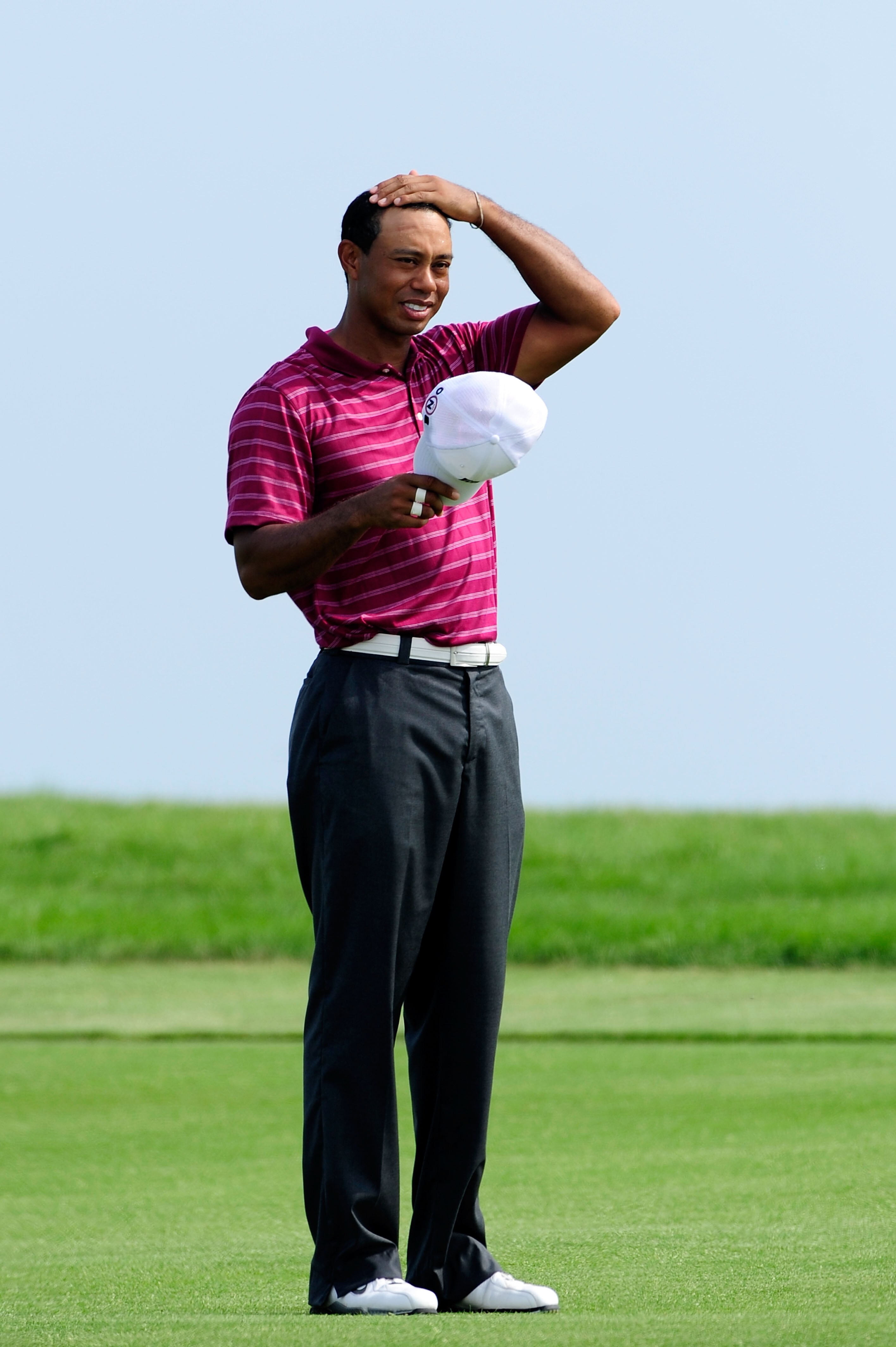 KOHLER, WI - AUGUST 10:  Tiger Woods looks on during a practice round prior to the start of the 92nd PGA Championship on the Straits Course at Whistling Straits on August 10, 2010 in Kohler, Wisconsin.  (Photo by Stuart Franklin/Getty Images)