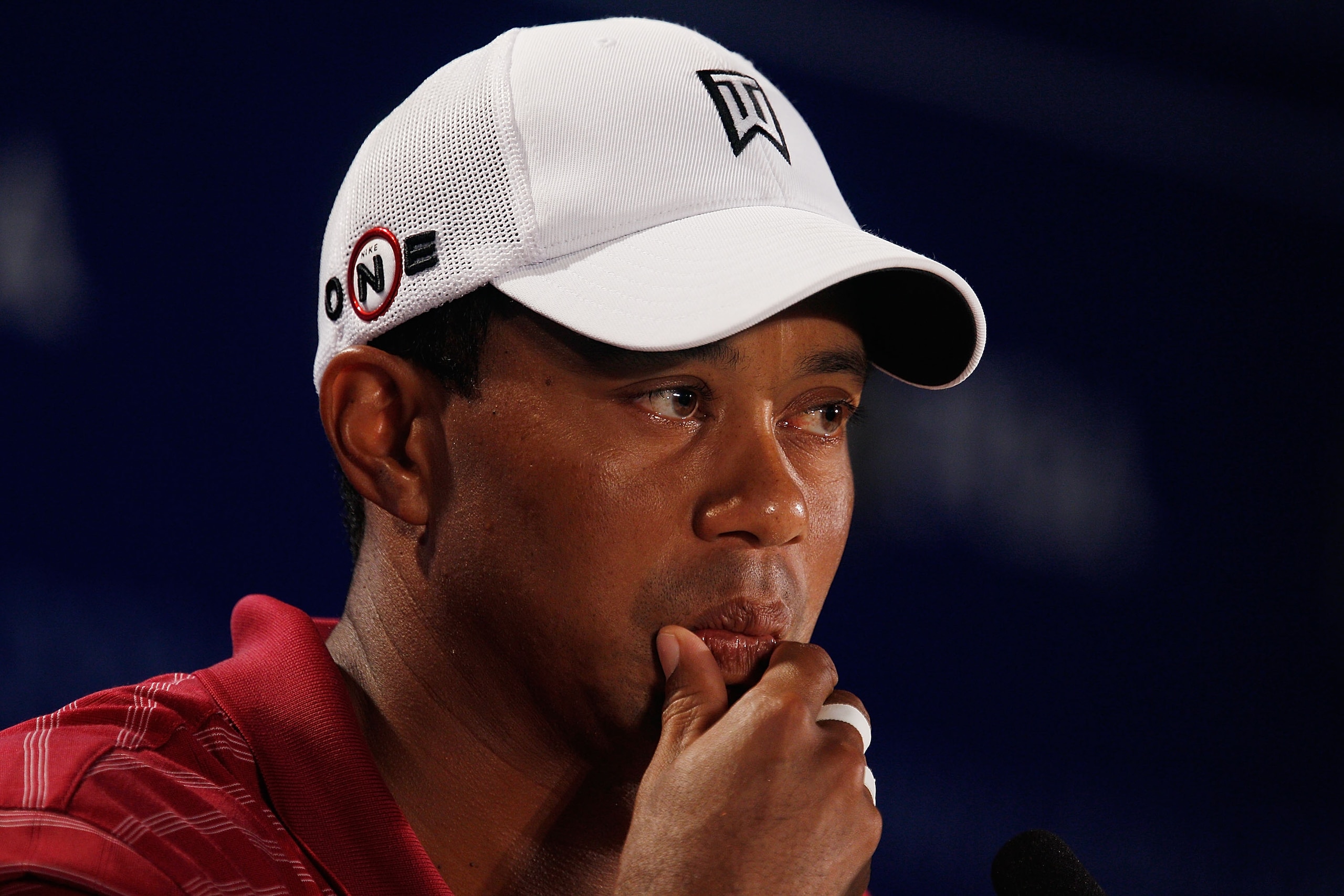 KOHLER, WI - AUGUST 10:  Tiger Woods is interviewed during a press conference prior to the start of the 92nd PGA Championship on the Straits Course at Whistling Straits on August 10, 2010 in Kohler, Wisconsin.  (Photo by Scott Halleran/Getty Images)