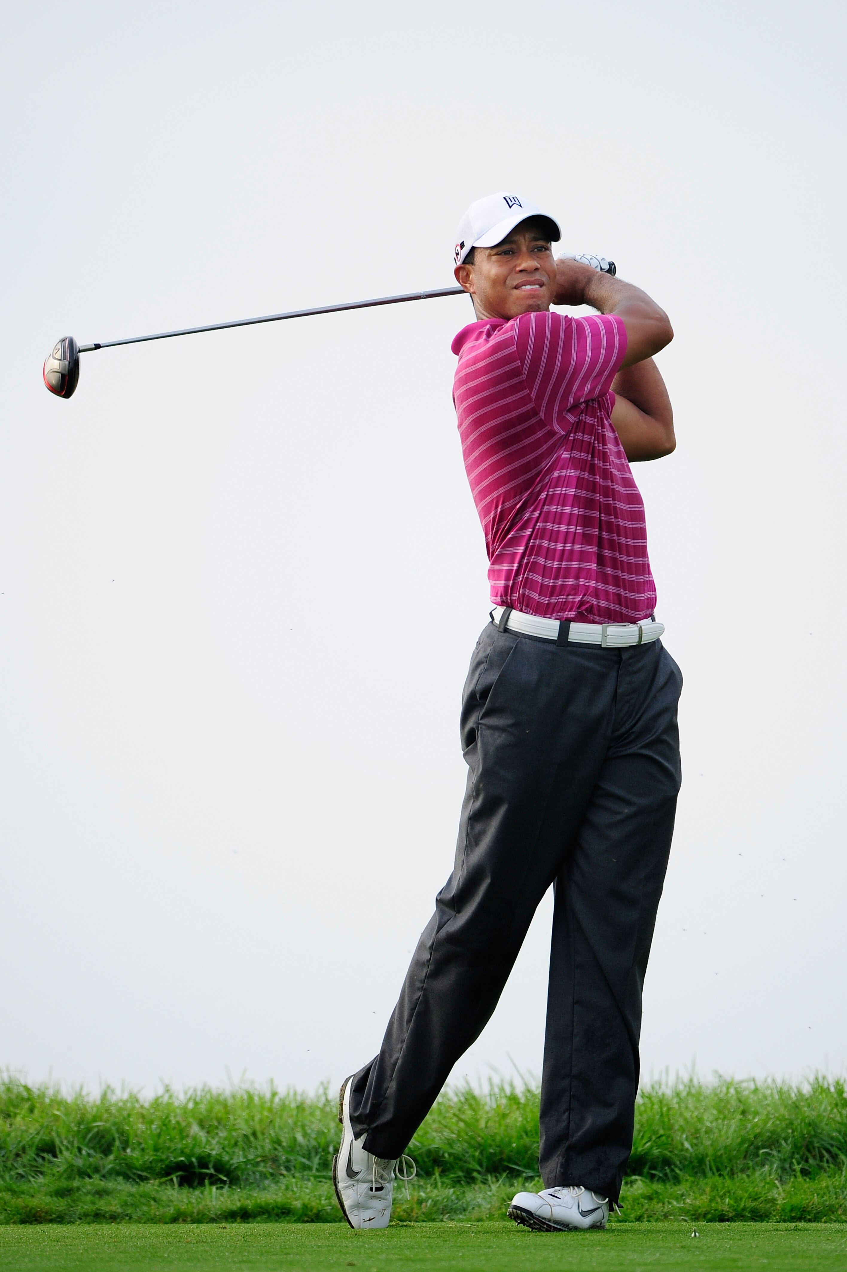 KOHLER, WI - AUGUST 10:  Tiger Woods hits a shot during a practice round prior to the start of the 92nd PGA Championship on the Straits Course at Whistling Straits on August 10, 2010 in Kohler, Wisconsin.  (Photo by Stuart Franklin/Getty Images)