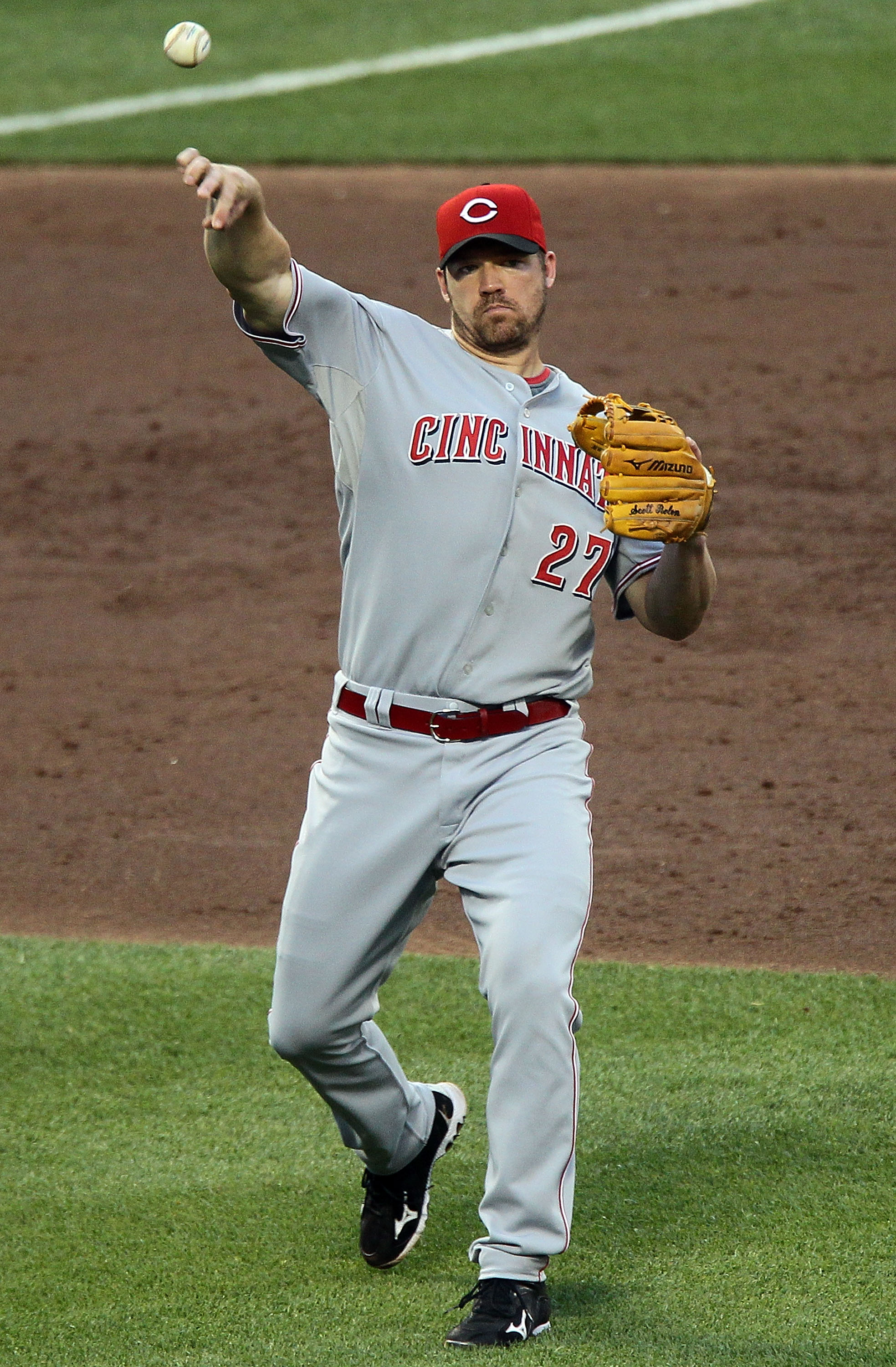 NEW YORK - JULY 06:  Scott Rolen #27 of the Cincinnati Reds warms up against the New York Mets on July 6, 2010 at Citi Field in the Flushing neighborhood of the Queens borough of New York City.  (Photo by Jim McIsaac/Getty Images)