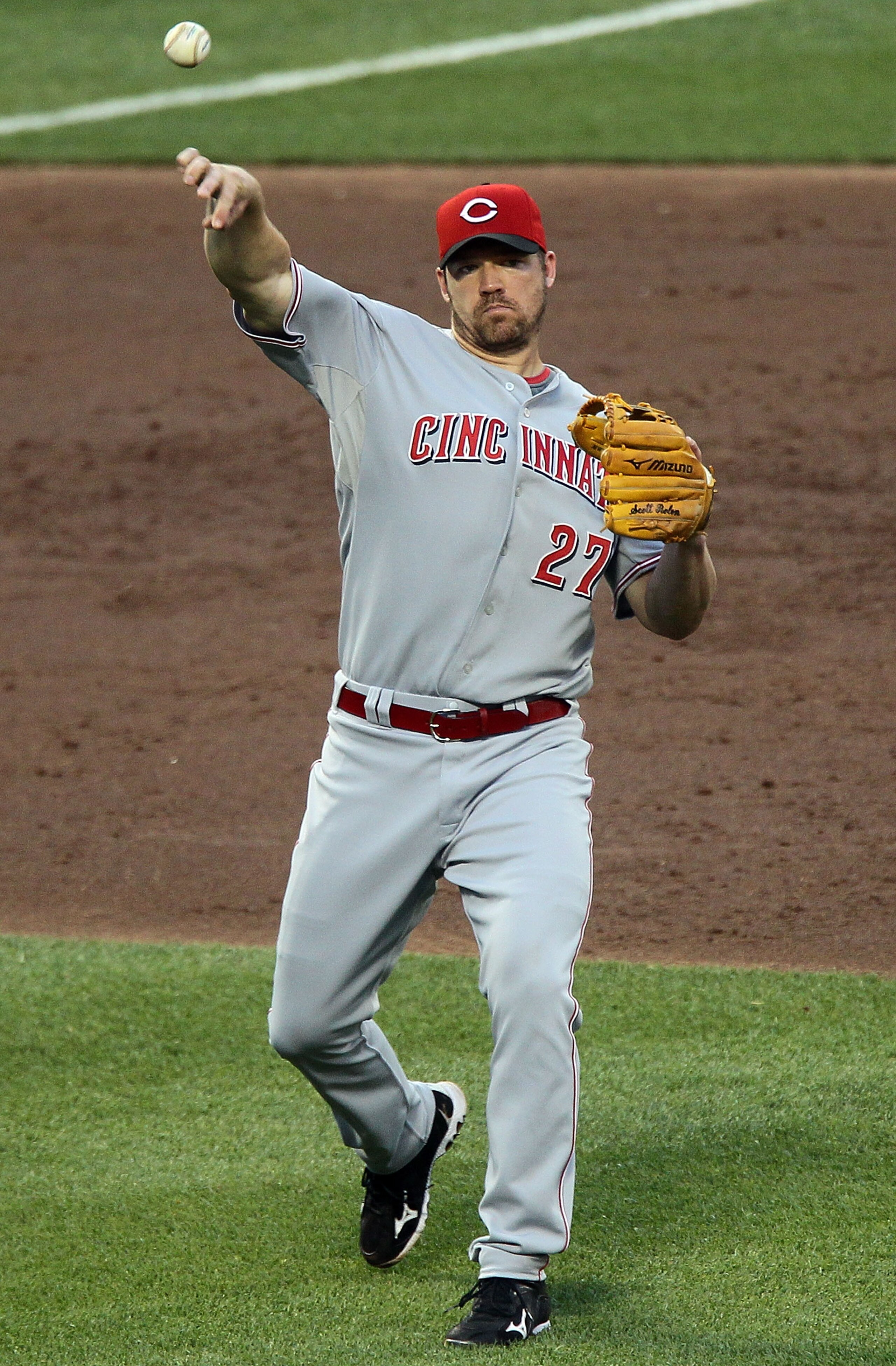 NEW YORK - JULY 06:  Scott Rolen #27 of the Cincinnati Reds warms up against the New York Mets on July 6, 2010 at Citi Field in the Flushing neighborhood of the Queens borough of New York City.  (Photo by Jim McIsaac/Getty Images)