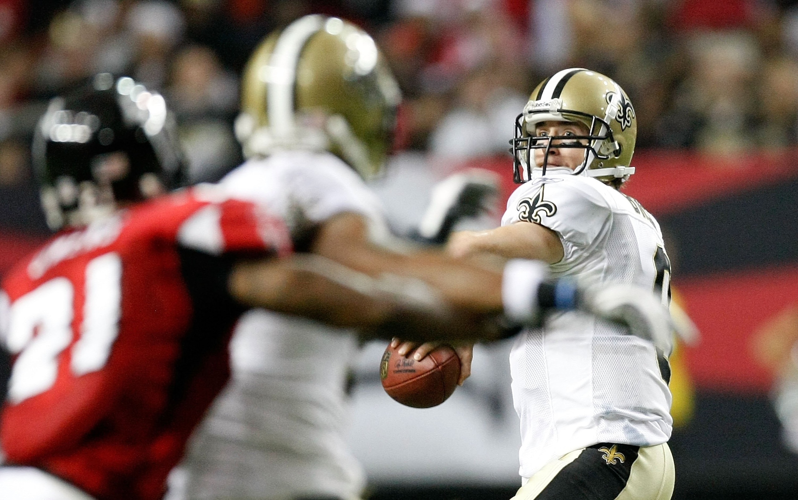 ATLANTA - DECEMBER 13: Quarterback Drew Brees #9 of the New Orleans Saints against the Atlanta Falcons at Georgia Dome on December 13, 2009 in Atlanta, Georgia. (Photo by Kevin C. Cox/Getty Images) ATLANTA - DECEMBER 13: Quarterback Drew Brees #9 of the New Orleans Saints against the Atlanta Falcons at Georgia Dome on December 13, 2009 in Atlanta, Georgia. (Photo by Kevin C. Cox/Getty Images)