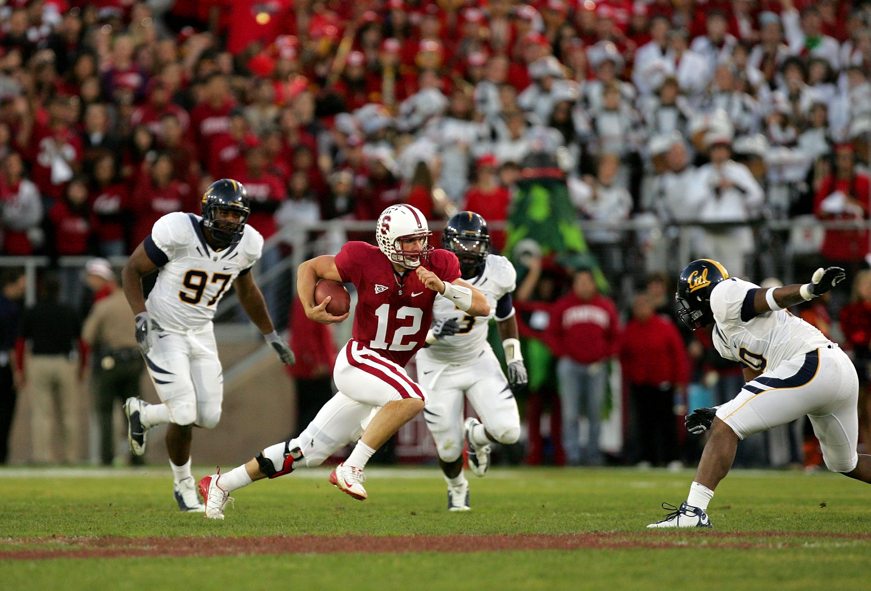 PALO ALTO, CA - NOVEMBER 21:  Andrew Luck #12 of the Stanford Cardinal scrambles for a first down against the California Bears at Stanford Stadium on November 21, 2009 in Palo Alto, California.  (Photo by Ezra Shaw/Getty Images)