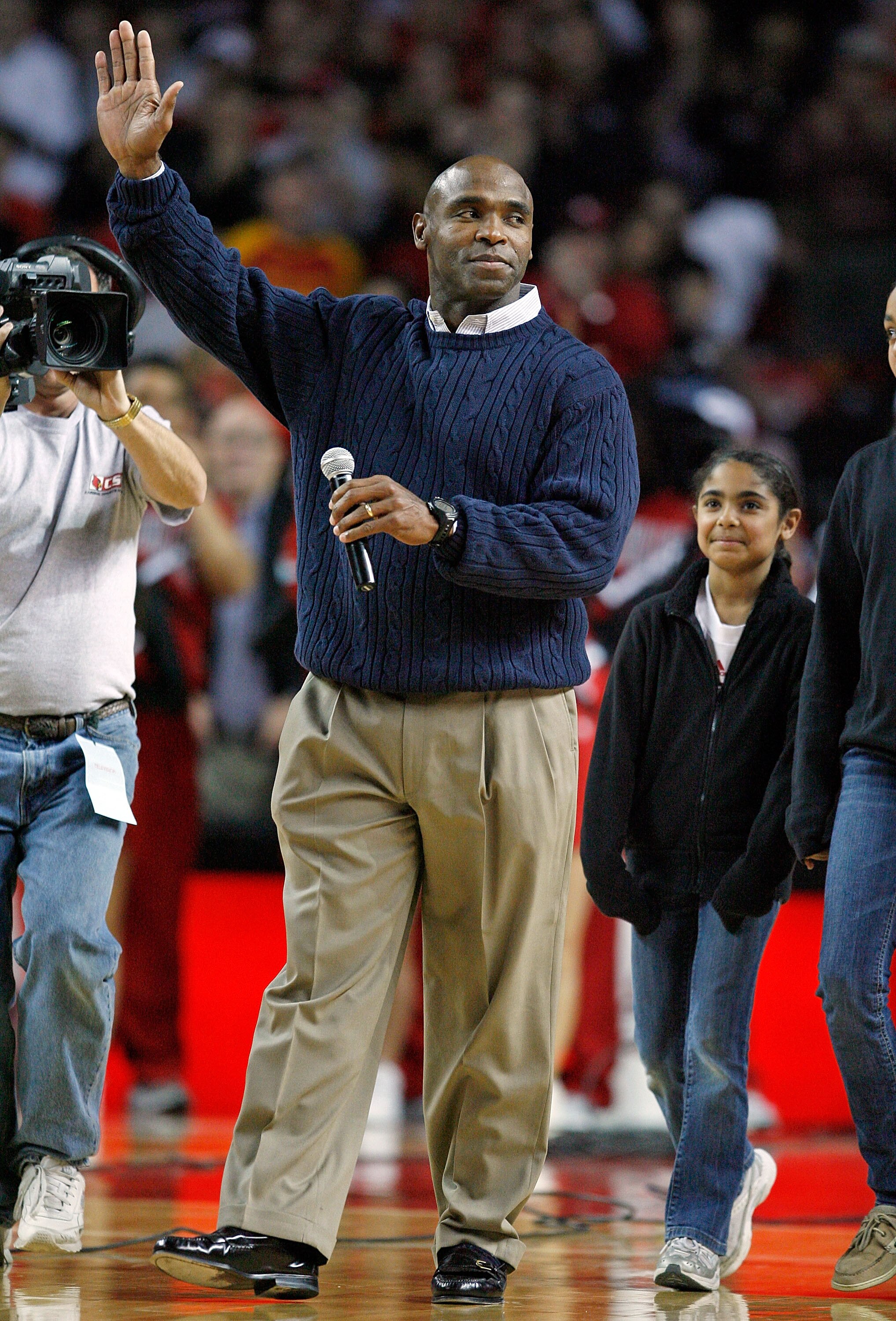 LOUISVILLE, KY - DECEMBER 12:  Charlie Strong the new football Head Coach of the Louisville Cardinals is pictured during the Louisville basketball game against the Western Carolina Catamounts on December 12, 2009 at Freedom Hall in Louisville, Kentucky.
