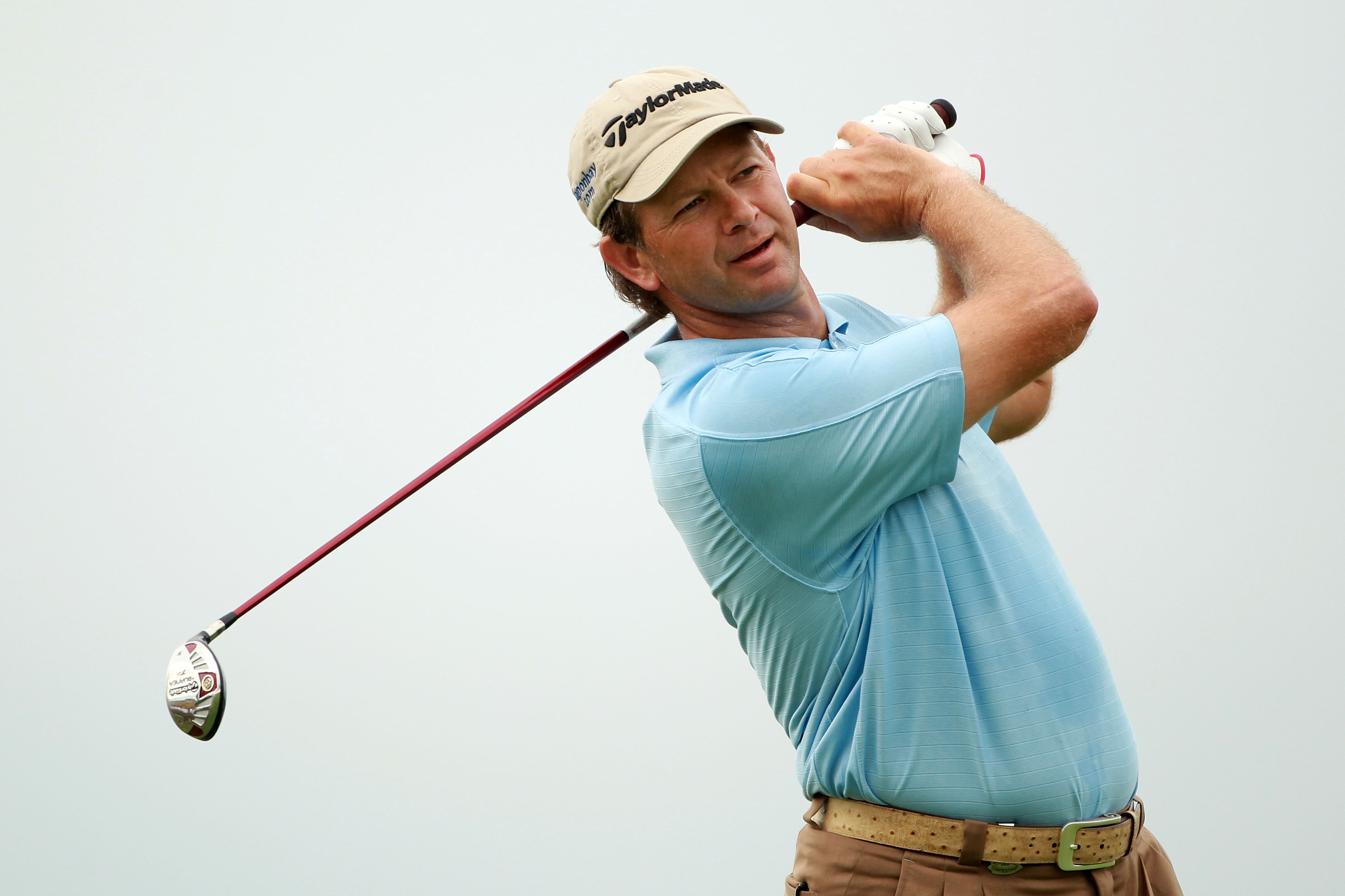 KOHLER, WI - AUGUST 11:  Retief Goosen of South Africa plays a shot during a practice round prior to the start of the 92nd PGA Championship on the Straits Course at Whistling Straits on August 11, 2010 in Kohler, Wisconsin.  (Photo by Andrew Redington/Get