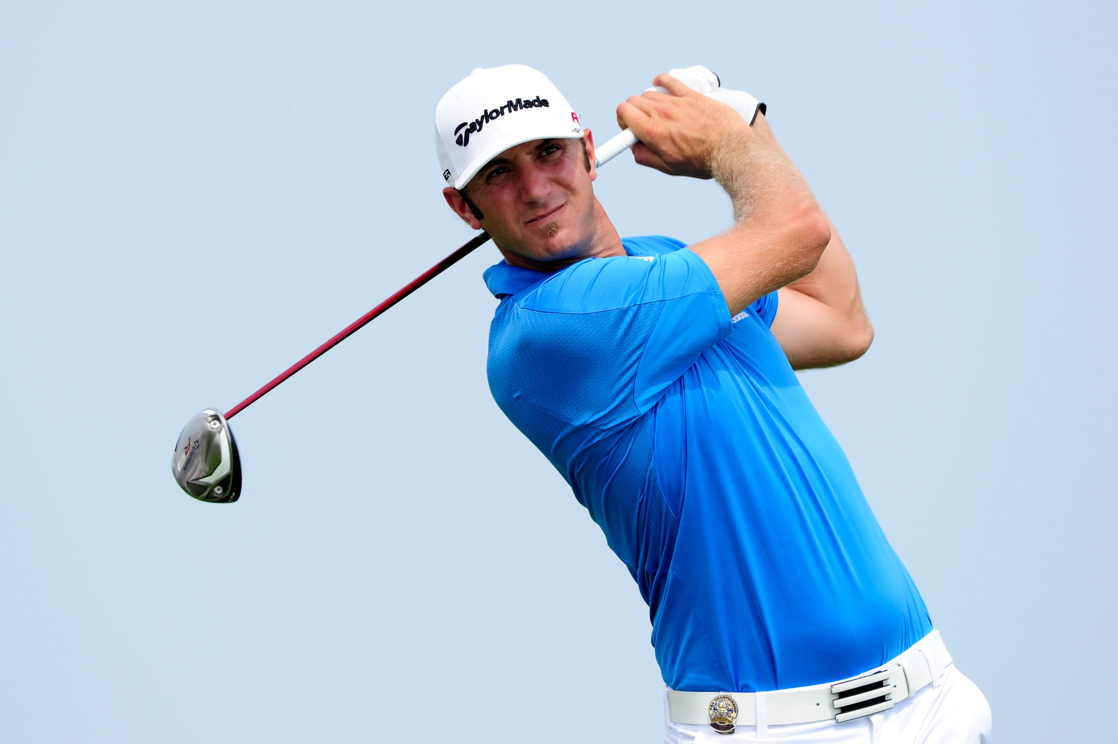 KOHLER, WI - AUGUST 10:  Dustin Johnson hits a shot during a practice round prior to the start of the 92nd PGA Championship on the Straits Course at Whistling Straits on August 10, 2010 in Kohler, Wisconsin.  (Photo by Stuart Franklin/Getty Images)