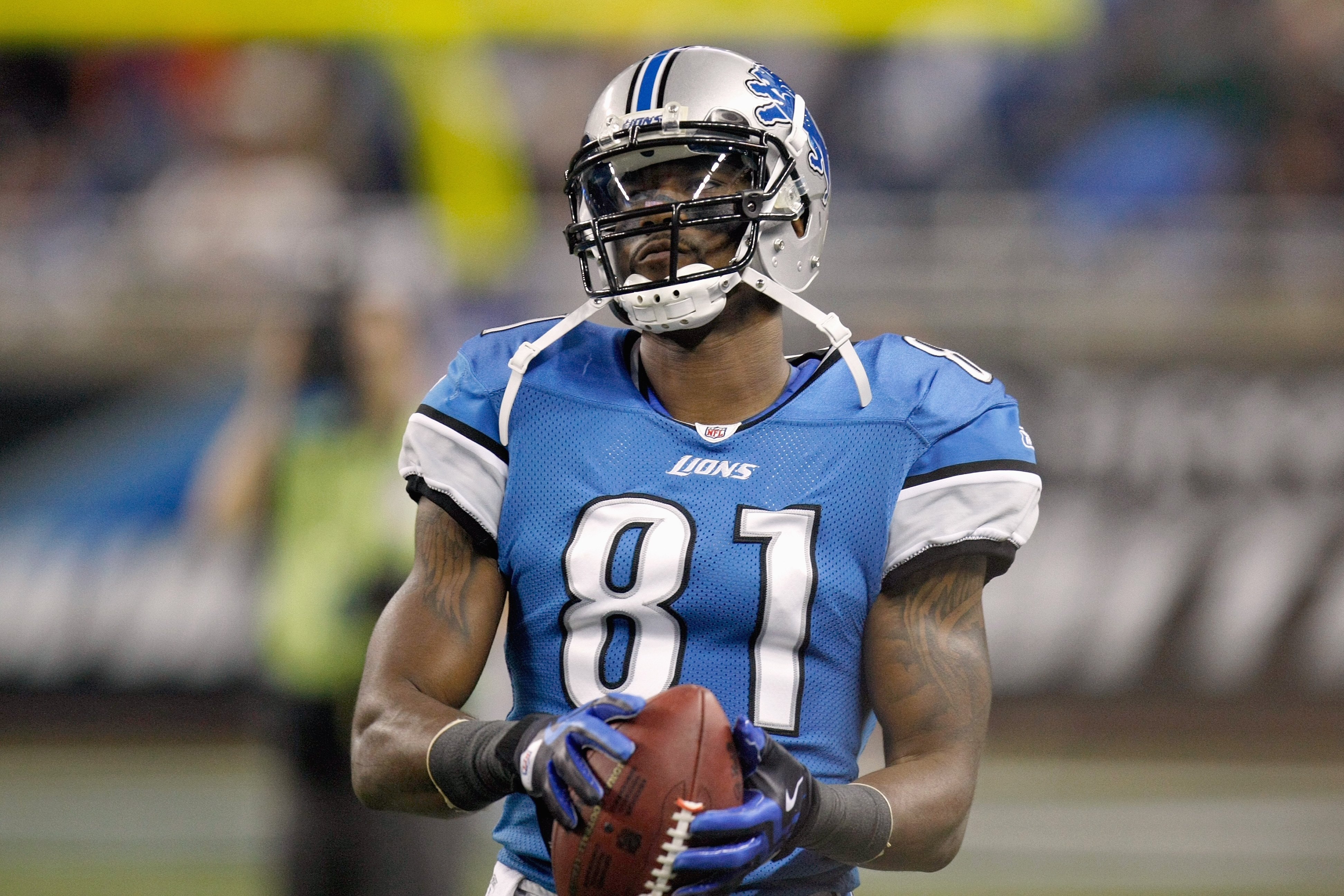 DETROIT , MI - NOVEMBER 26: Calvin Johnson #81 of the Detroit Lions looks on during the game against the Green Bay Packers on November 26, 2009 at Ford Field in Detroit, Michigan. Green Bay won the game 34-12. (Photo by Gregory Shamus/Getty Images)