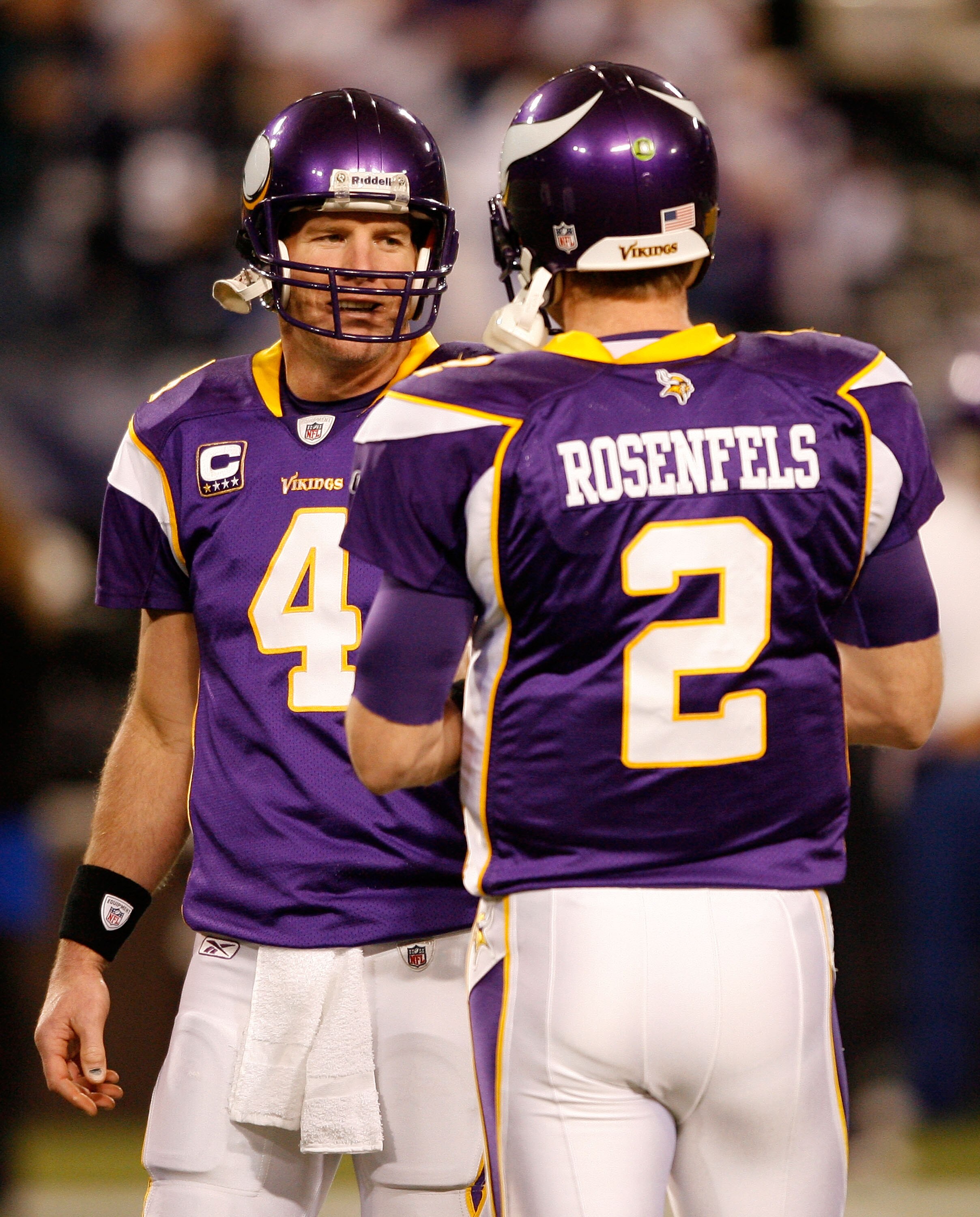 MINNEAPOLIS - JANUARY 17:  Quarterback Brett Favre #4 of the Minnesota Vikings talks with quarterback Sage Rosenfels #2 before the game against the Dallas Cowboys during the NFC Divisional Playoff Game at Hubert H. Humphrey Metrodome on January 17, 2010 i