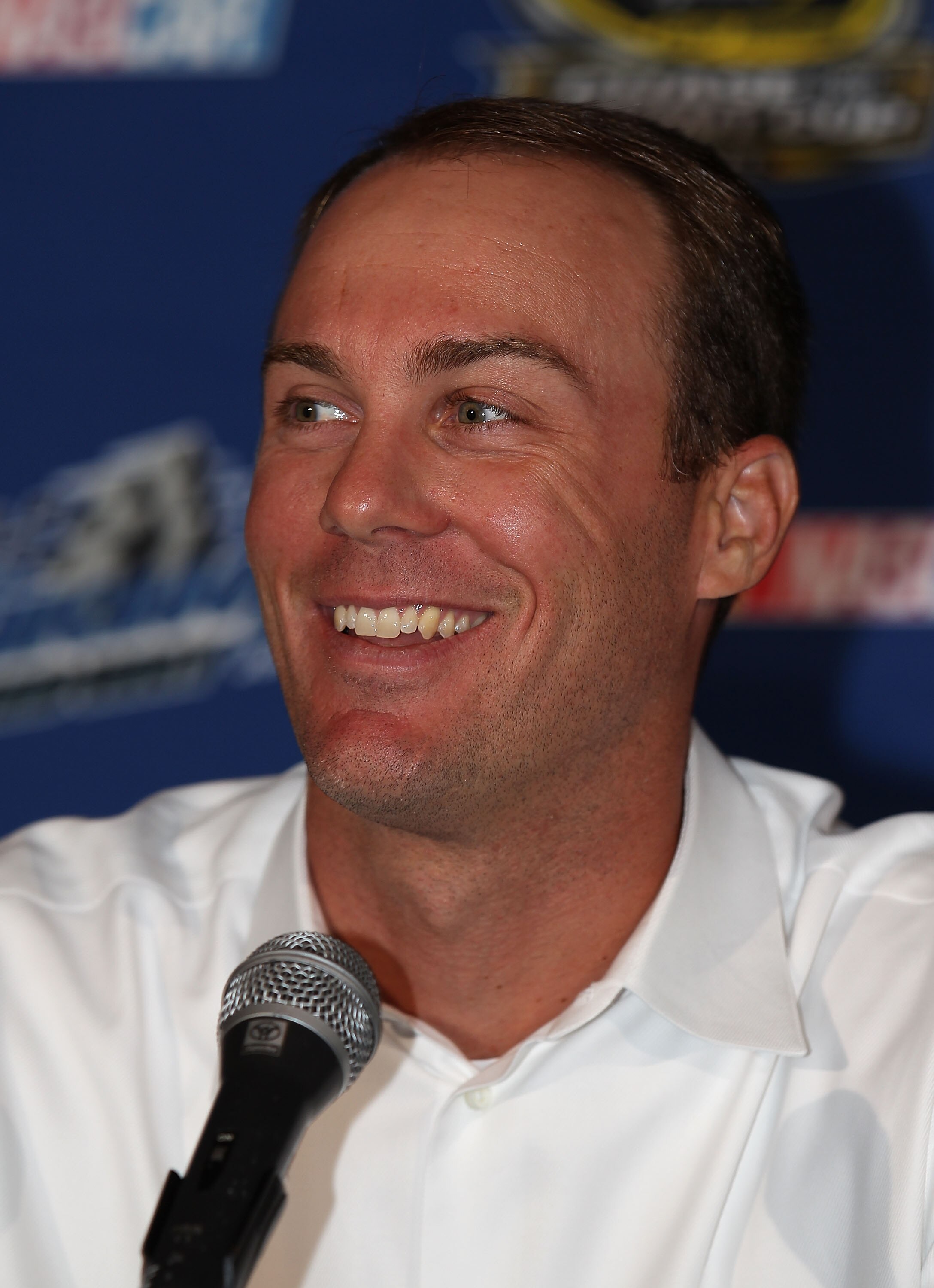 CHICAGO - AUGUST 09: Driver Kevin Harvick speaks during a press conference announcing that Chicagoland Speedway will host the first race in the 2011 Chase for the NASCAR Sprint Cup at Fulton's on the River on August 9, 2010 in Chicago, Illinois. (Photo by