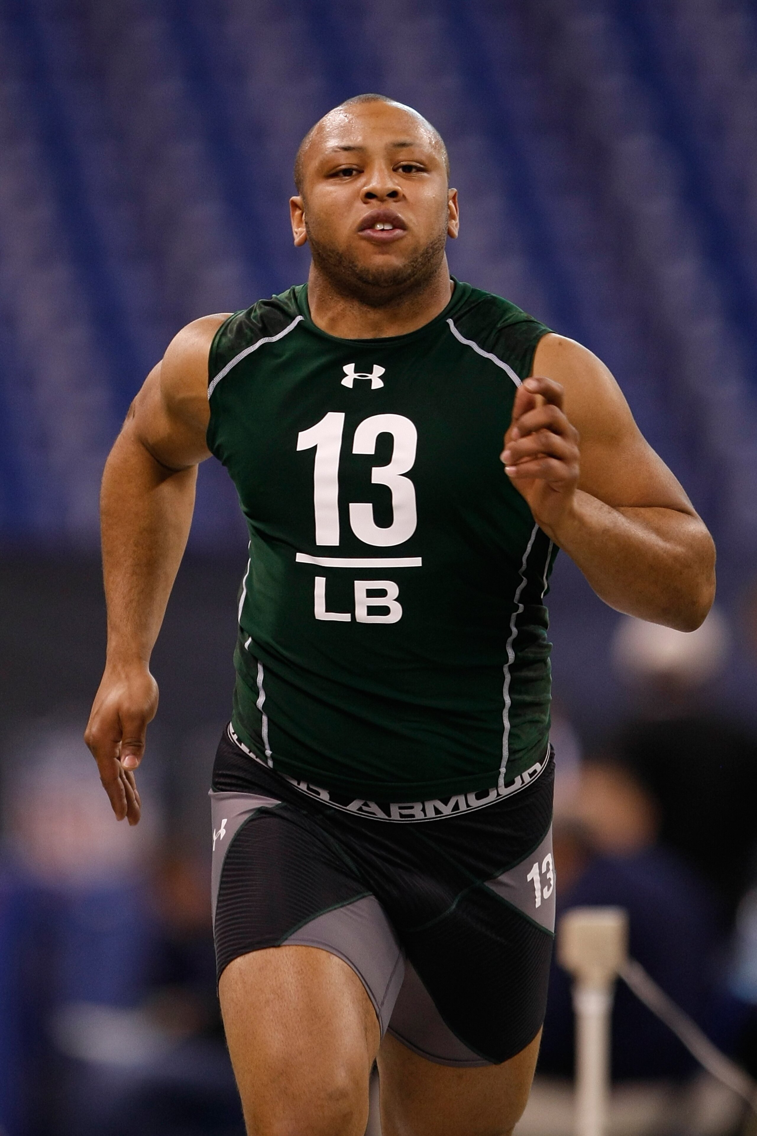 INDIANAPOLIS, IN - MARCH 1: Linebacker Phillip Dillard of Nebraska runs the 40 yard dash during the NFL Scouting Combine presented by Under Armour at Lucas Oil Stadium on March 1, 2010 in Indianapolis, Indiana. (Photo by Scott Boehm/Getty Images)