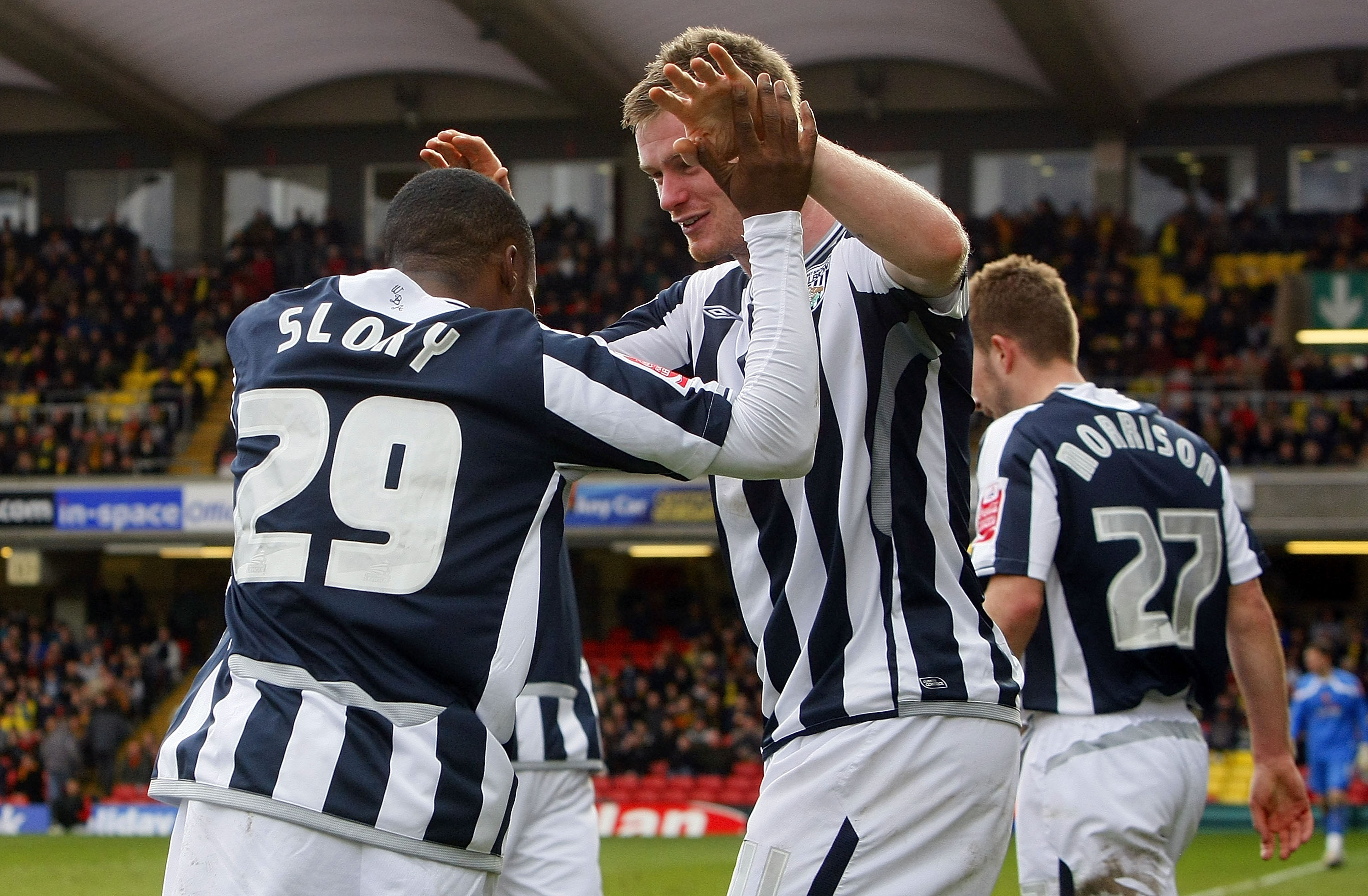 WATFORD, ENGLAND - APRIL 05: Goalscorer Chris Brunt (R) and Andwele Slory (L) of West Bromwich Albion celebrate the equalising goal during the Coca Cola Championship match between Watford and West Bromwich Albion at Vicarage Road on April 05, 2010 in Watf