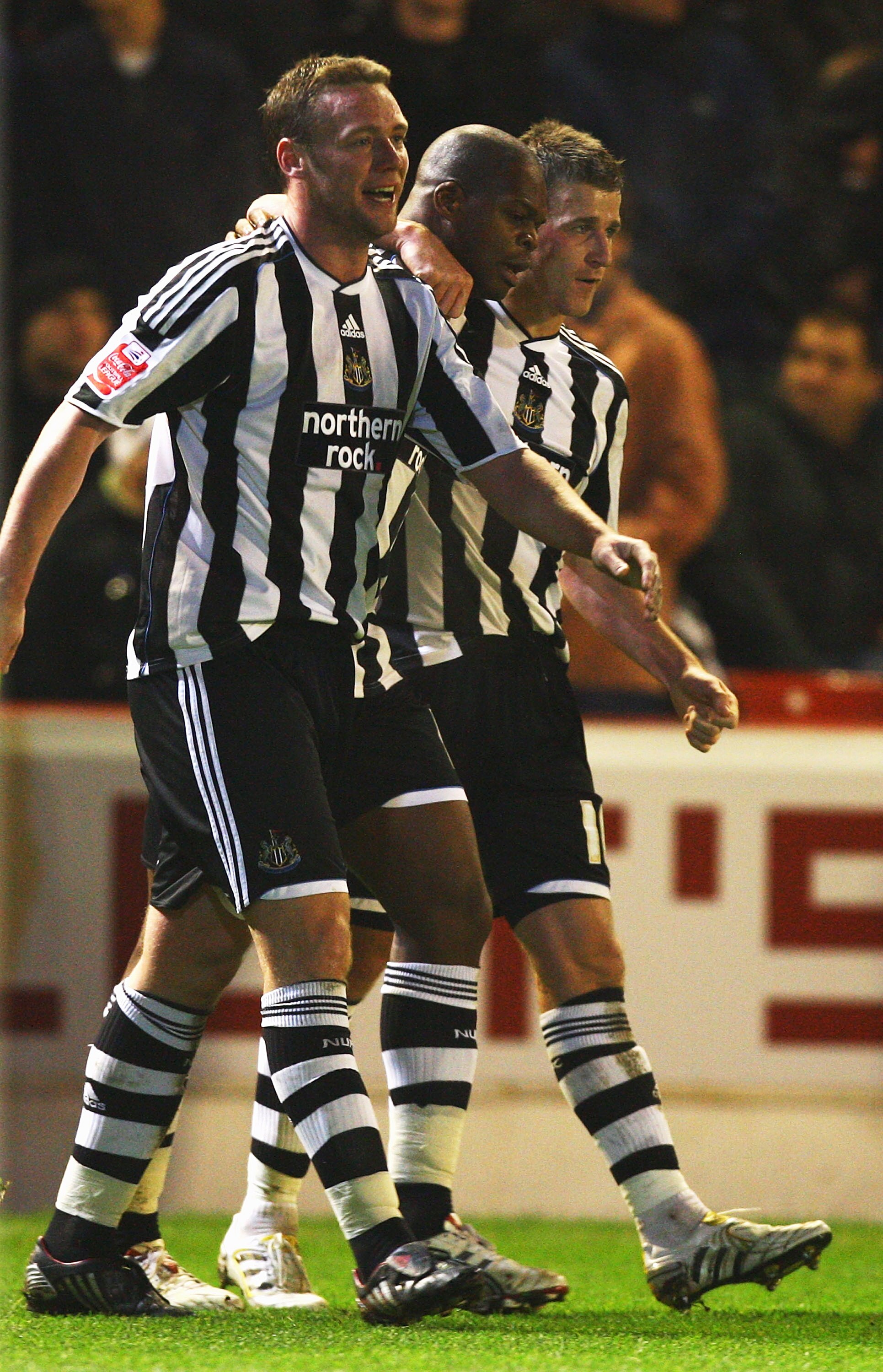BARNSLEY, ENGLAND - DECEMBER 12:  Marlon Harewood of Newcastle is congratulated on his goal during the Coca-Cola Championship match between Barnsley and Newcastle United at Oakwell on December 12, 2009 in Barnsley, England.  (Photo by Matthew Lewis/Getty