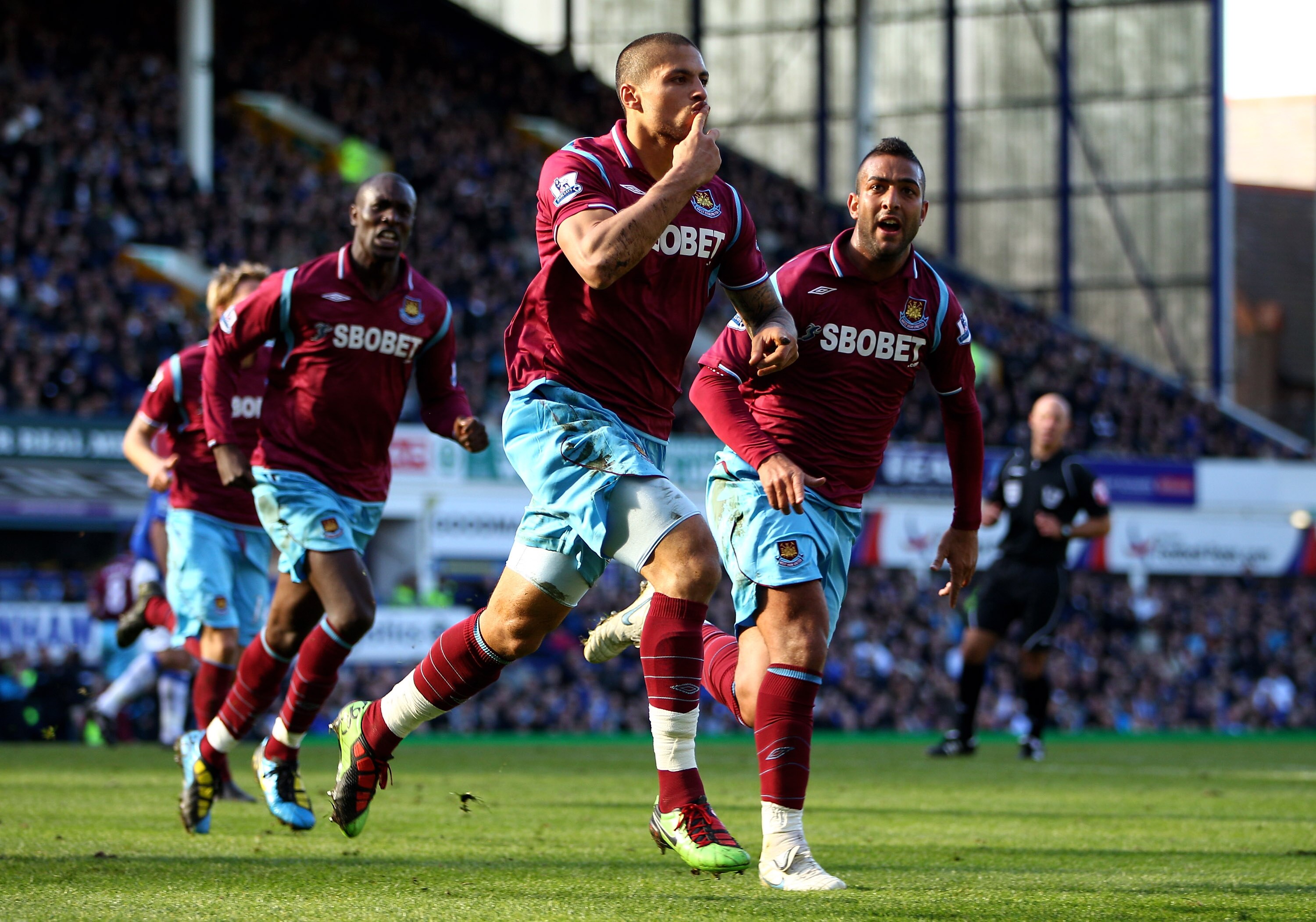 LIVERPOOL, ENGLAND - APRIL 04:  Manuel Da Costa of West Ham United celebrates scoring an equalising goal with team mate Mido (R) during the Barclays Premier League match between Everton and West Ham United at Goodison Park on April 4, 2010 in Liverpool, E