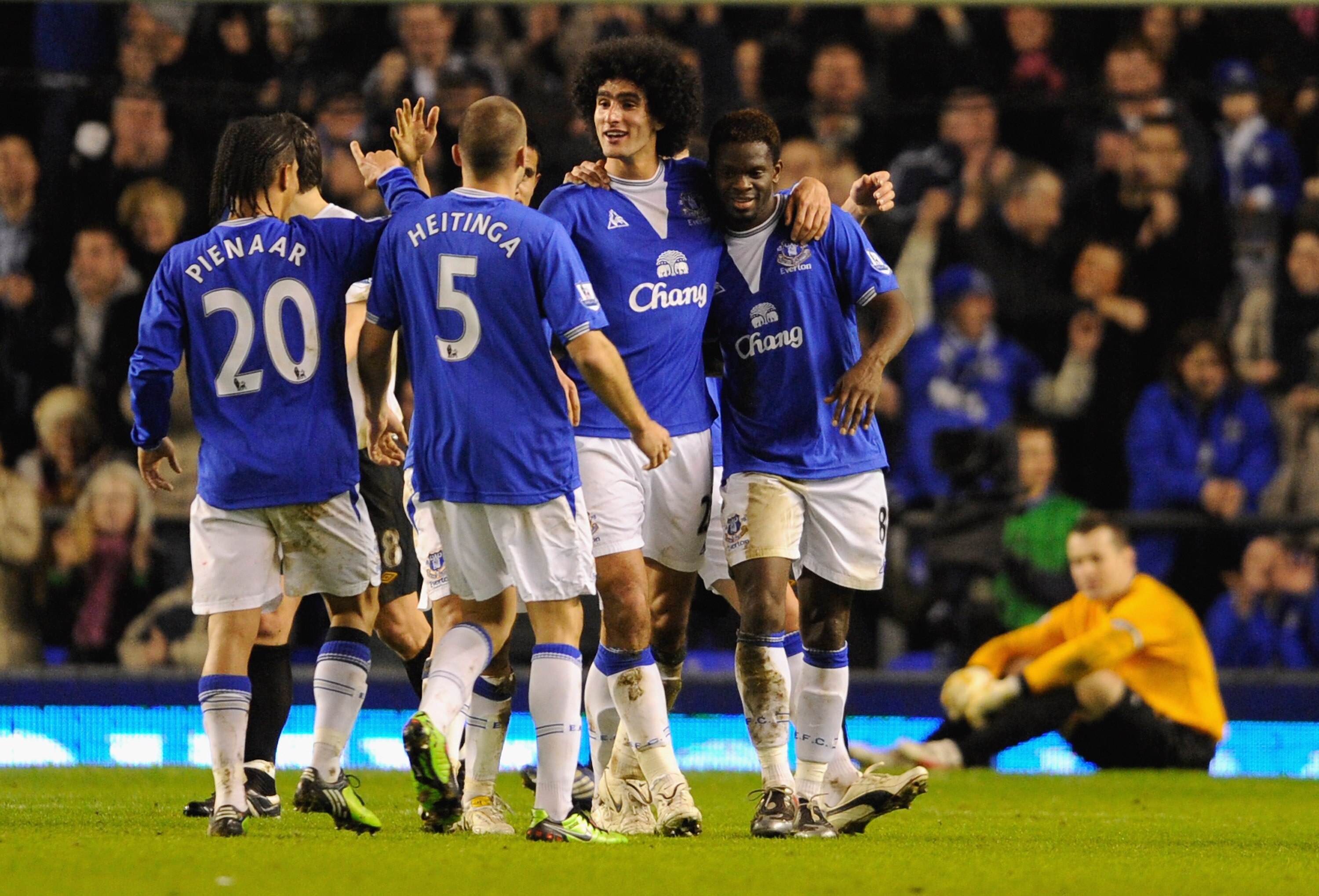 LIVERPOOL, ENGLAND - JANUARY 16:  Louis Saha of Everton is congratulated by his team mates after scoring his team's second goal from a penalty during the Barclays Premier League match between Everton and Manchester City at Goodison Park on January 16, 201