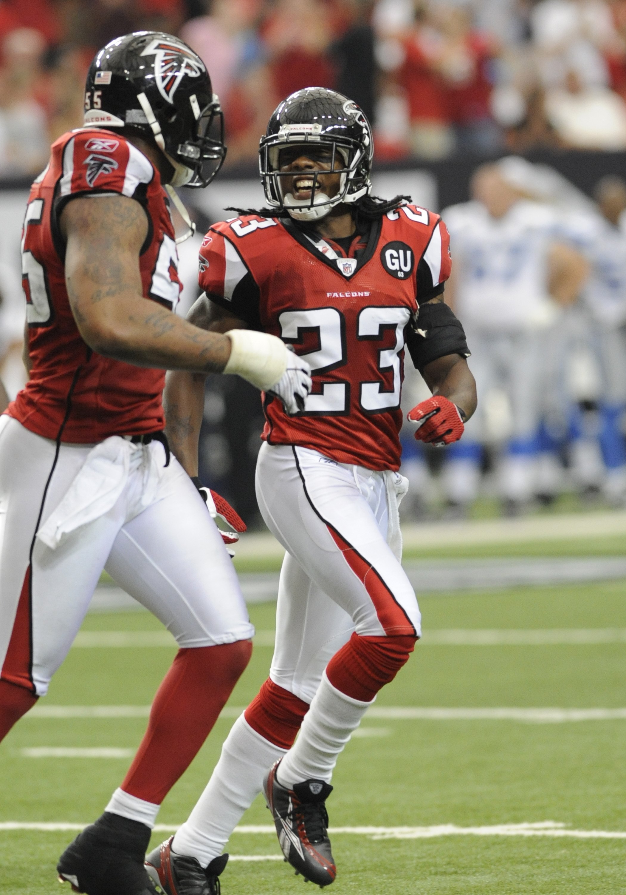 ATLANTA, GA - SEPTEMBER 7: Cornerback Chris Houston #23 of the Atlanta Falcons celebrates a defensive stop against the Detroit Lions at the Georgia Dome on September 7, 2008 in Atlanta, Georgia.  (Photo by Al Messerschmidt/Getty Images)