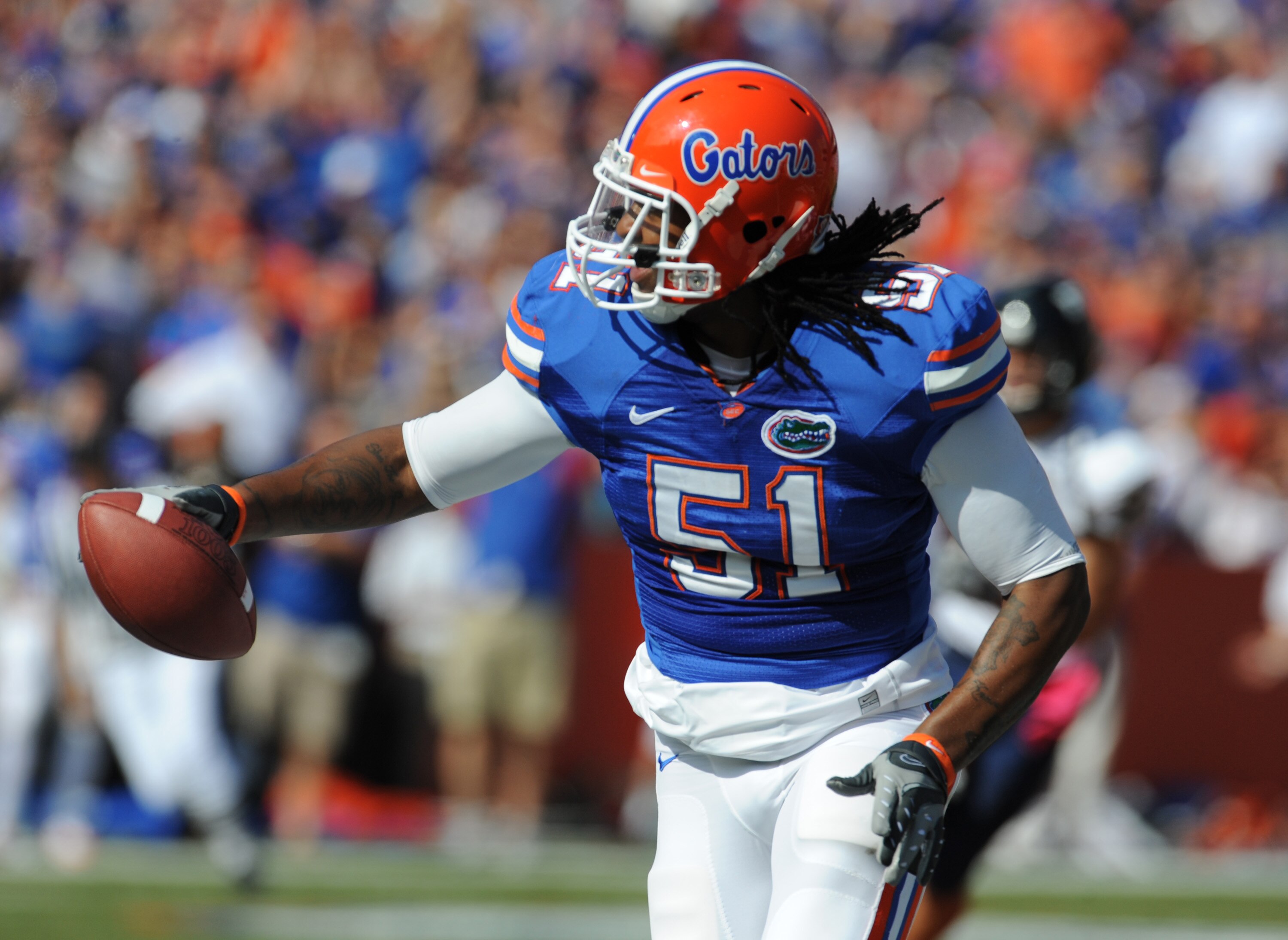 GAINESVILLE, FL - NOVEMBER 21: Linebacker Brandon Spikes #51 of the Florida Gators returns an interception 40 yards for a first-quarter touchdown against the Florida International University Golden Panthers, November 21, 2009 at Ben Hill Griffin Stadium i