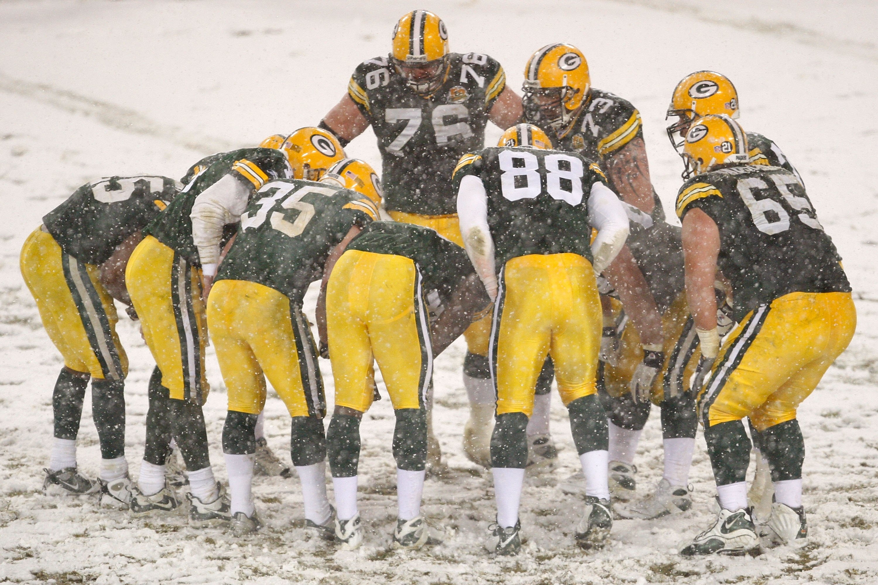 GREEN BAY, WI - JANUARY 12:  The Green Bay Packers huddle in the third quarter against the Seattle Seahawks during the NFC divisional playoff game on January 12, 2008 at Lambeau Field in Green Bay, Wisconsin. The Packers defeated the Seahawks 42-20 to adv