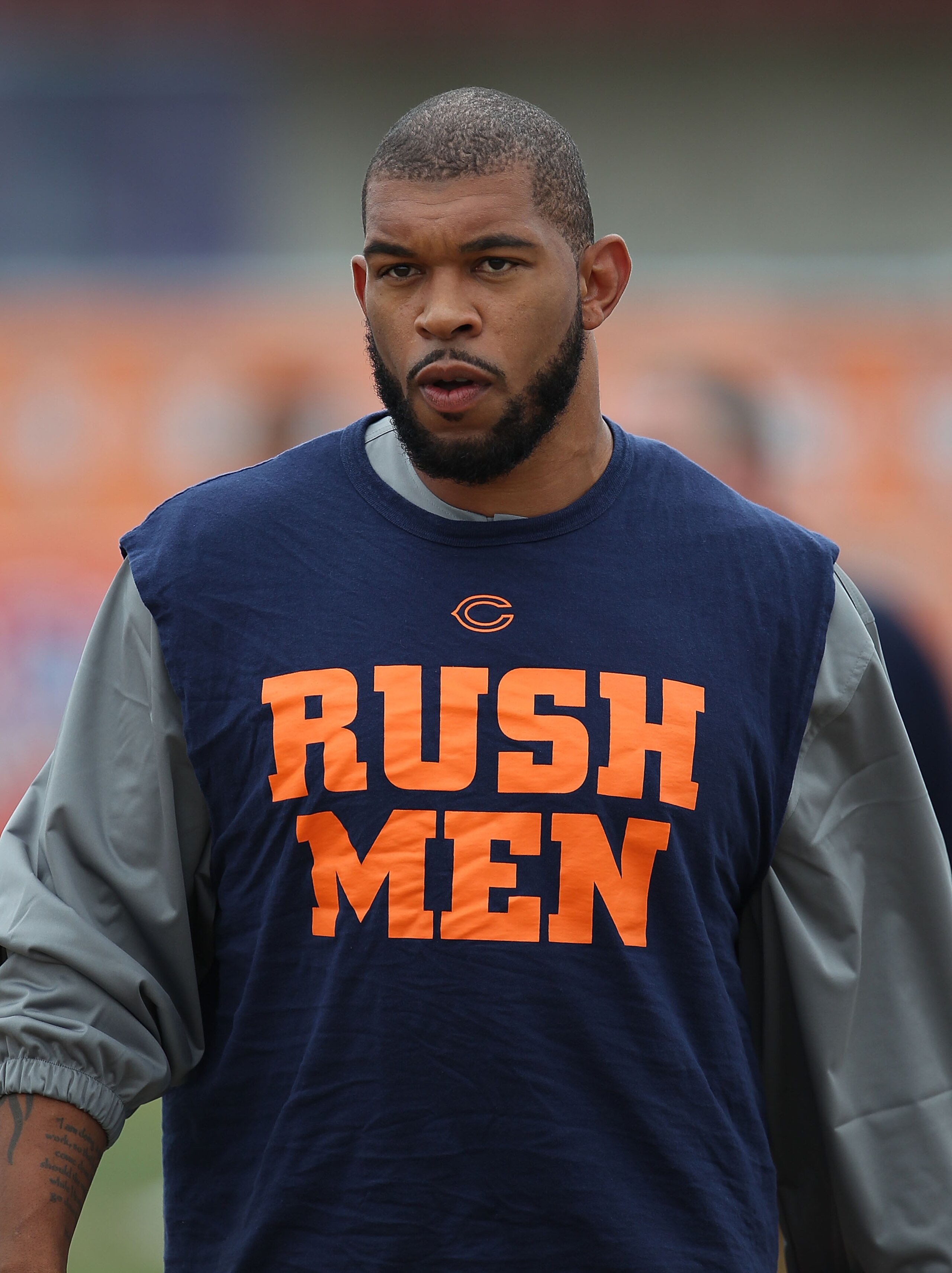 BOURBONNAIS, IL - JULY 30: Julius Peppers #90 of the Chicago Bears walks out for a summer training camp practice at Olivet Nazarene University on July 30, 2010 in Bourbonnais, Illinois. (Photo by Jonathan Daniel/Getty Images)
