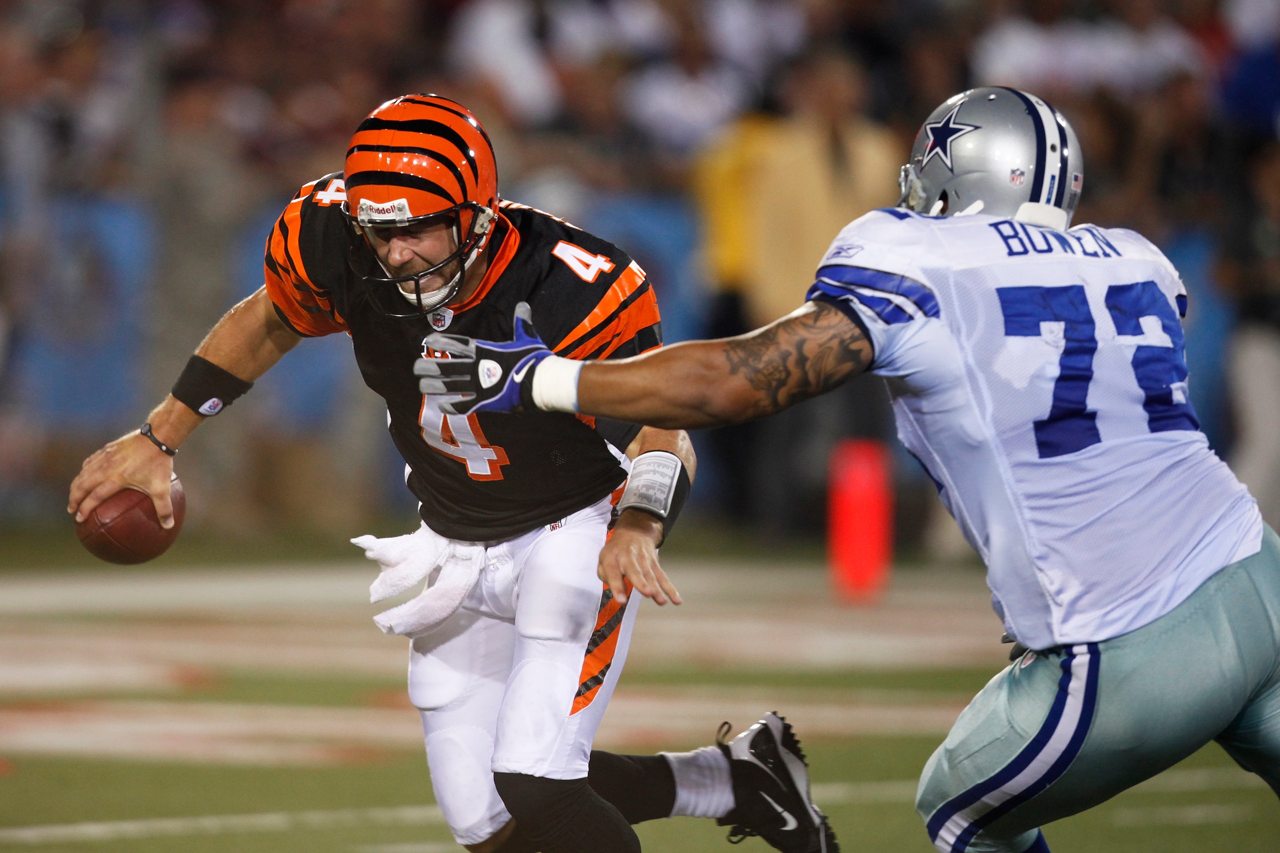 CANTON, OH - AUGUST 8: Stephen Bowen #72 of the Dallas Cowboys pressures J.T. O'Sullivan #4 of the Cincinnati Bengals during the 2010 Pro Football Hall of Fame Game at the Pro Football Hall of Fame Field at Fawcett Stadium on August 8, 2010 in Canton, Ohi