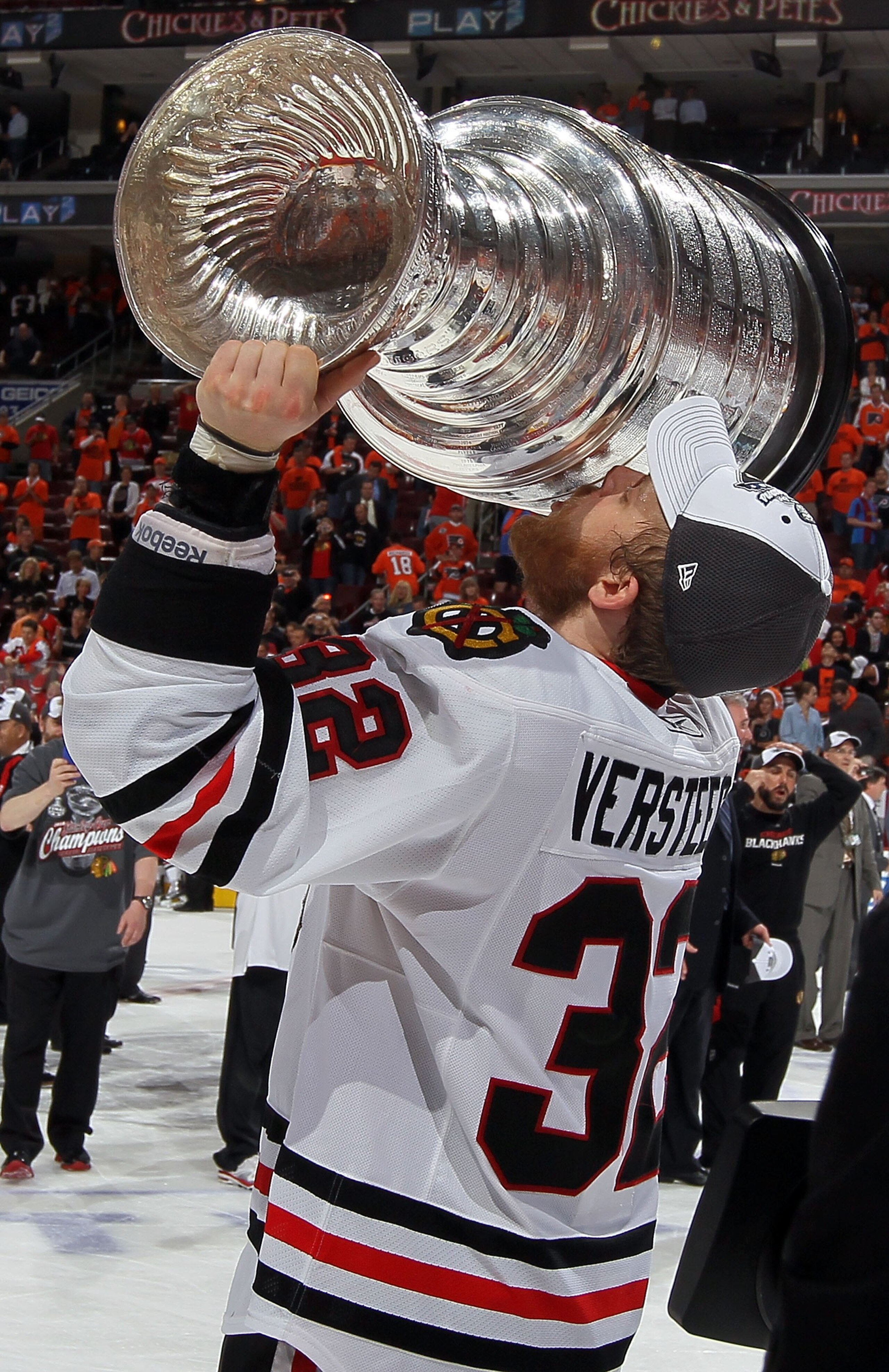 PHILADELPHIA - JUNE 09: Kris Versteeg #32 of the Chicago Blackhawks kisses the Stanley Cup after teammate Patrick Kane scored the game-winning goal in overtime to defeat the Philadelphia Flyers 4-3 and win the Stanley Cup in Game Six of the 2010 NHL Stan PHILADELPHIA - JUNE 09: Kris Versteeg #32 of the Chicago Blackhawks kisses the Stanley Cup after teammate Patrick Kane scored the game-winning goal in overtime to defeat the Philadelphia Flyers 4-3 and win the Stanley Cup in Game Six of the 2010 NHL Stan