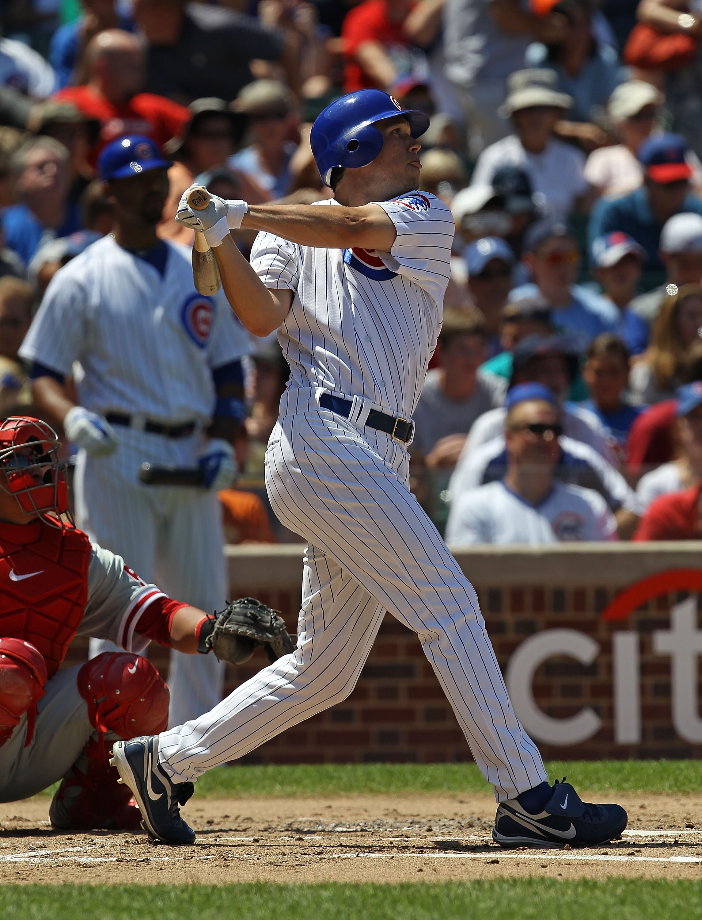 CHICAGO - JULY 16: Tyler Colvin #21 of the Chicago Cubs hits the ball against the Philadelphia Phillies at Wrigley Field on July 16, 2010 in Chicago, Illinois. The Cubs defeated the Phillies 4-3. (Photo by Jonathan Daniel/Getty Images)