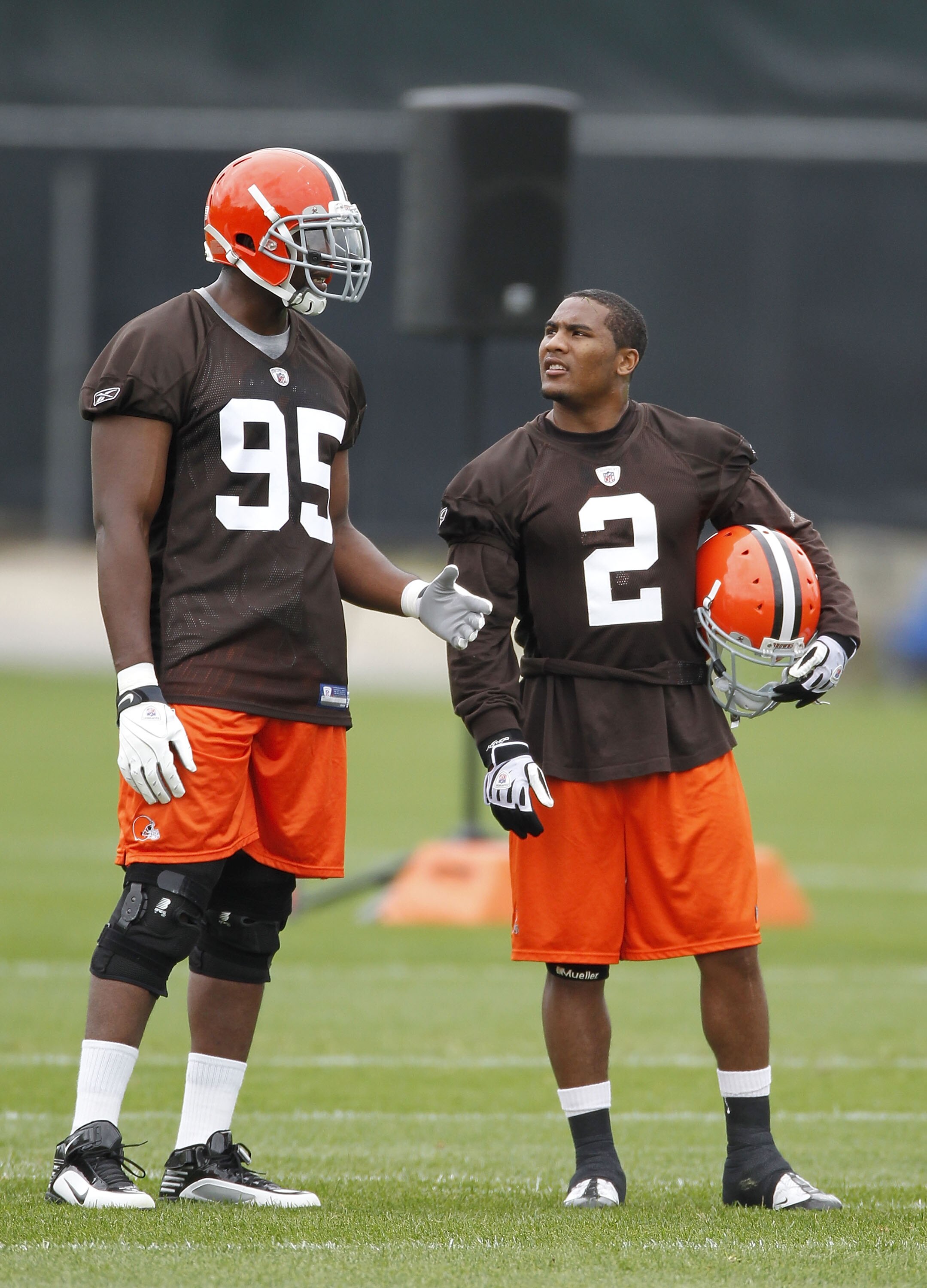 BEREA, OH - MAY 01:  T.J. Ward #2 of the Cleveland Browns talks with Clifton Geathers #95 during rookie mini camp at the Cleveland Browns Training and Administrative Complex on May 1, 2010 in Berea, Ohio.  (Photo by Gregory Shamus/Getty Images)
