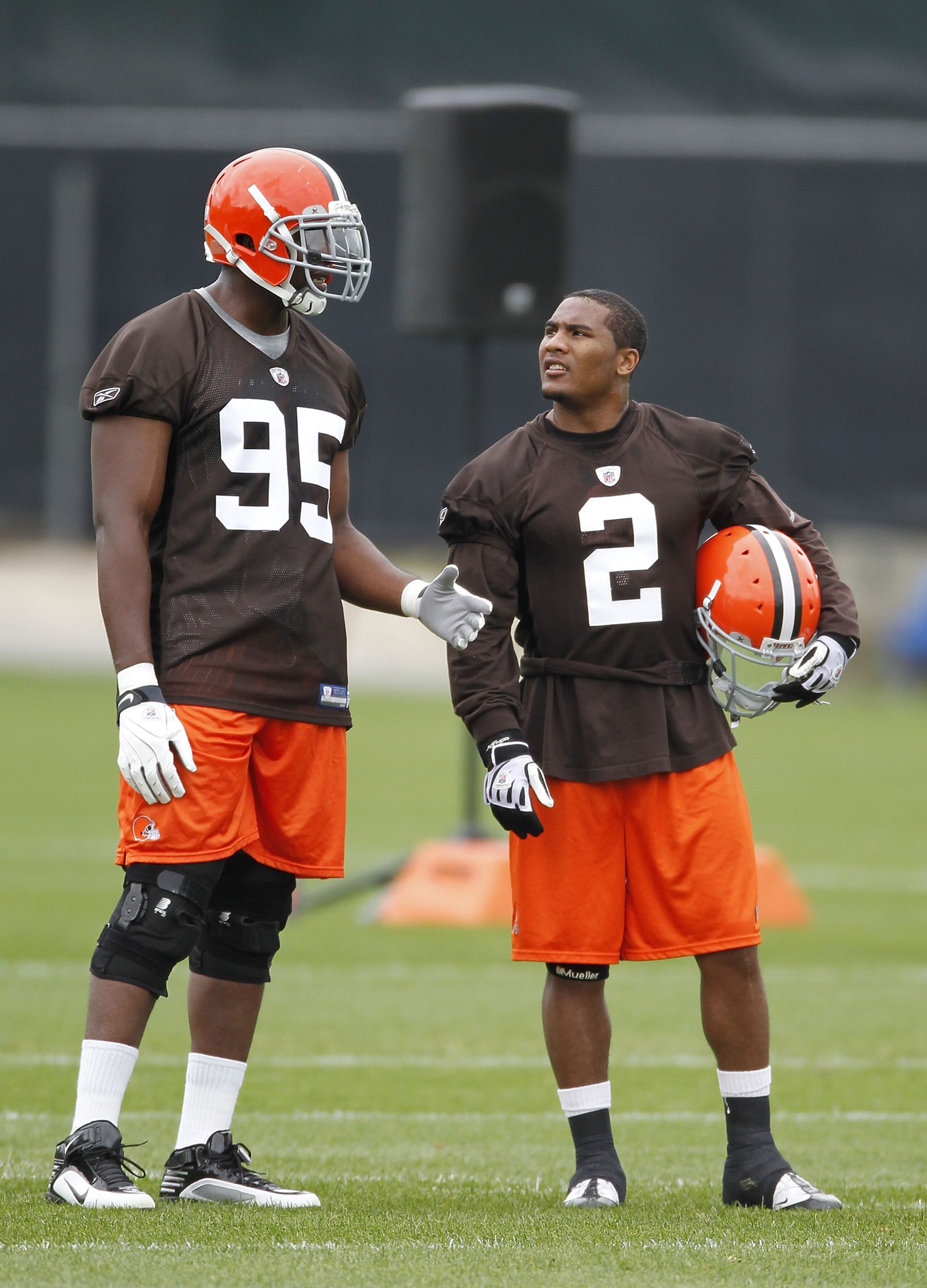 BEREA, OH - MAY 01:  T.J. Ward #2 of the Cleveland Browns talks with Clifton Geathers #95 during rookie mini camp at the Cleveland Browns Training and Administrative Complex on May 1, 2010 in Berea, Ohio.  (Photo by Gregory Shamus/Getty Images)