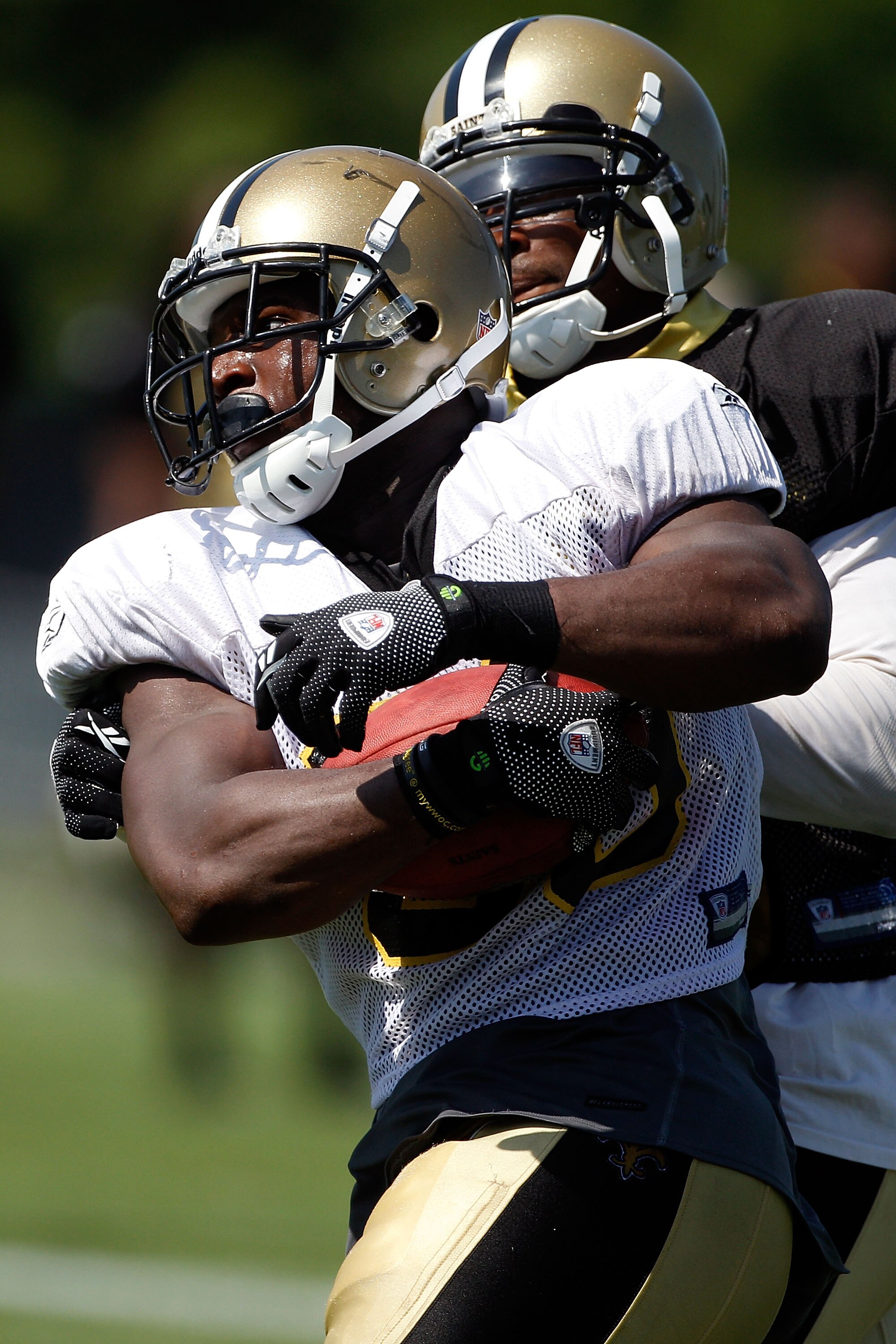 METAIRIE, LA - JULY 30: Lynell Hamilton #30 of the New Orleans Saints practice on the first day of Training Camp on July 30, 2010 in Metairie, Louisiana.  (Photo by Chris Graythen/Getty Images)