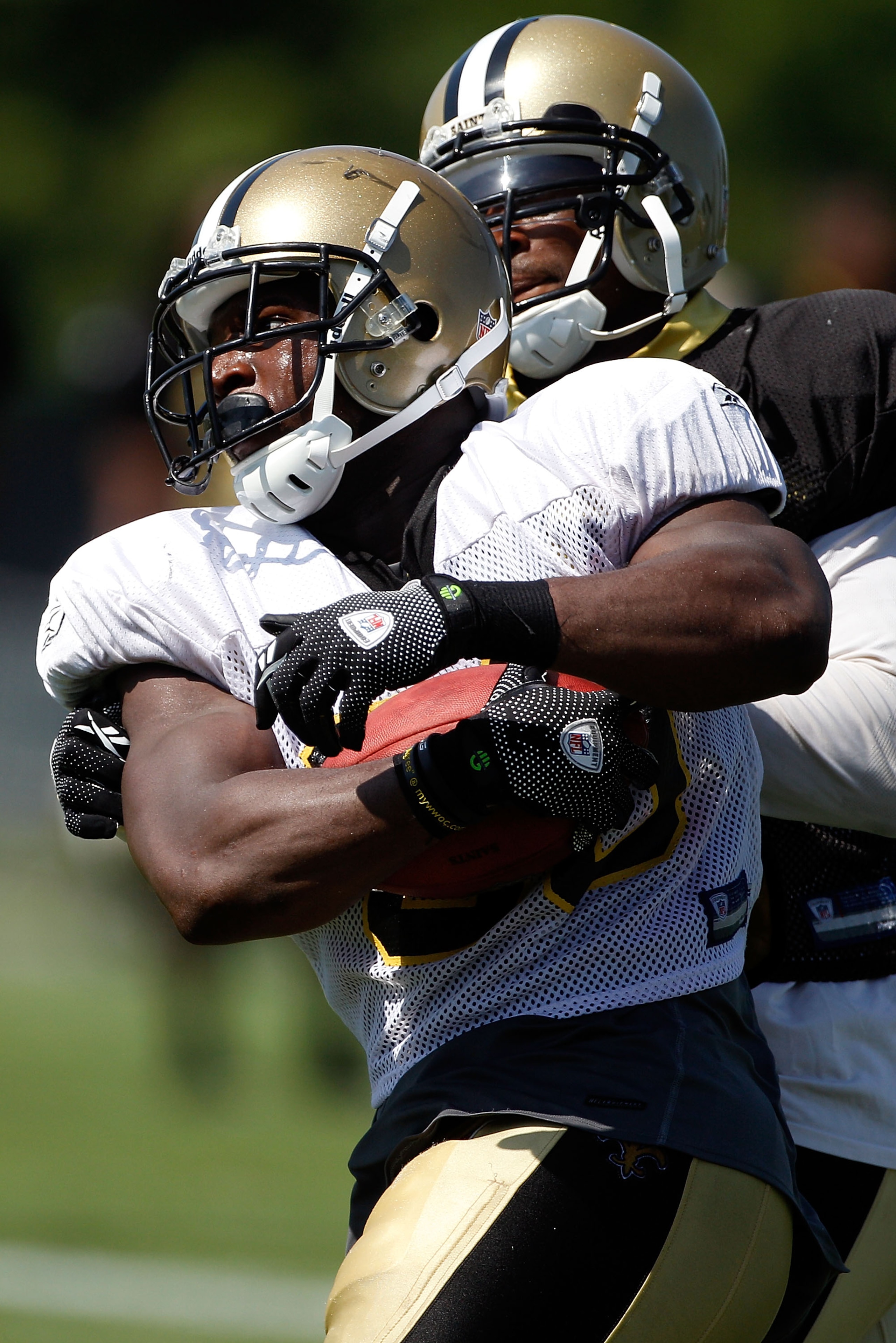 METAIRIE, LA - JULY 30: Lynell Hamilton #30 of the New Orleans Saints practice on the first day of Training Camp on July 30, 2010 in Metairie, Louisiana.  (Photo by Chris Graythen/Getty Images)