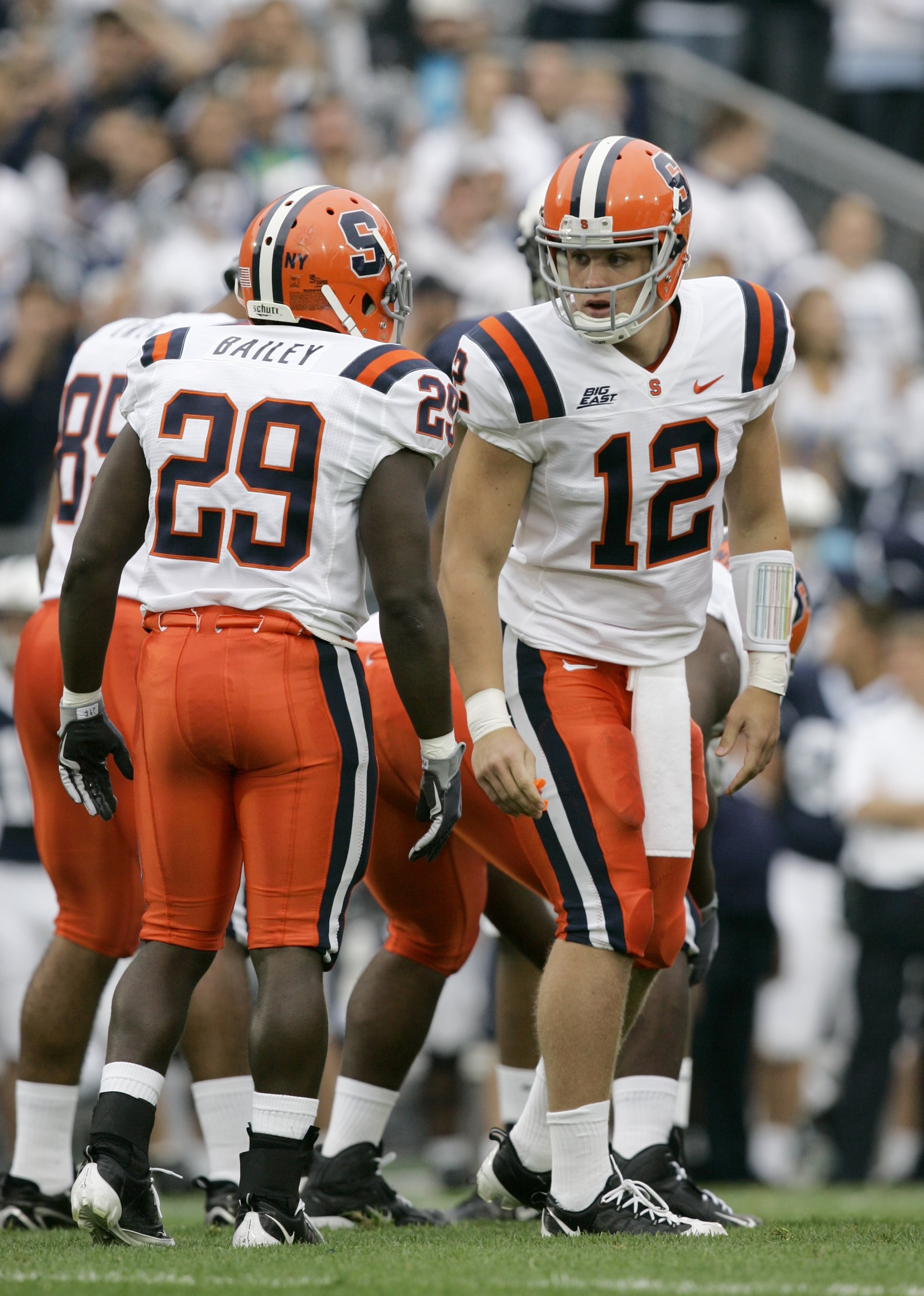 STATE COLLEGE, PA - SEPTEMBER 12: Quarterback Ryan Nassib #12 of the Syracuse Orangemen talks to running back Antwon Bailey #29 during the first half against the Penn State Nittany Lions at Beaver Stadium September 12, 2009 in State College, Pennsylvania STATE COLLEGE, PA - SEPTEMBER 12: Quarterback Ryan Nassib #12 of the Syracuse Orangemen talks to running back Antwon Bailey #29 during the first half against the Penn State Nittany Lions at Beaver Stadium September 12, 2009 in State College, Pennsylvania
