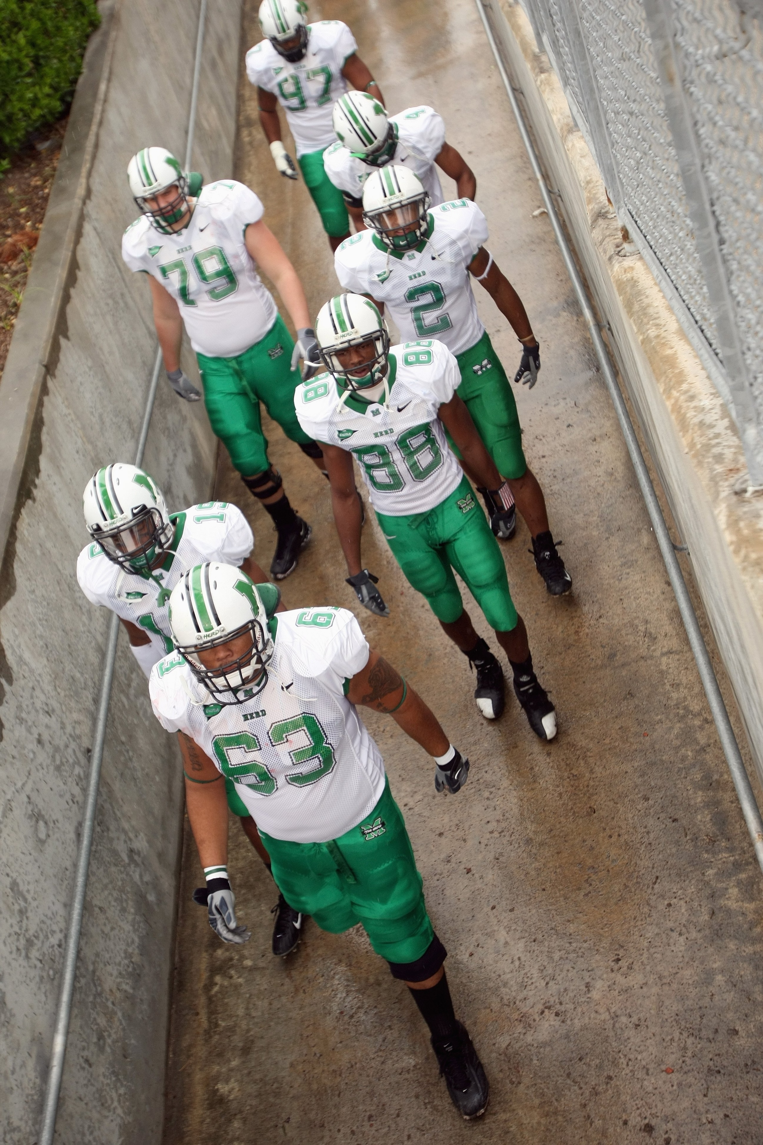 HOUSTON - NOVEMBER 17: The Marshall Thundering Herd walk down the ramp to take the field for the game with the Houston Cougars at Robertson Stadium November 17, 2007 in Houston, Texas. Houston won 35-28. (Photo by Stephen Dunn/Getty Images) HOUSTON - NOVEMBER 17: The Marshall Thundering Herd walk down the ramp to take the field for the game with the Houston Cougars at Robertson Stadium November 17, 2007 in Houston, Texas. Houston won 35-28. (Photo by Stephen Dunn/Getty Images)