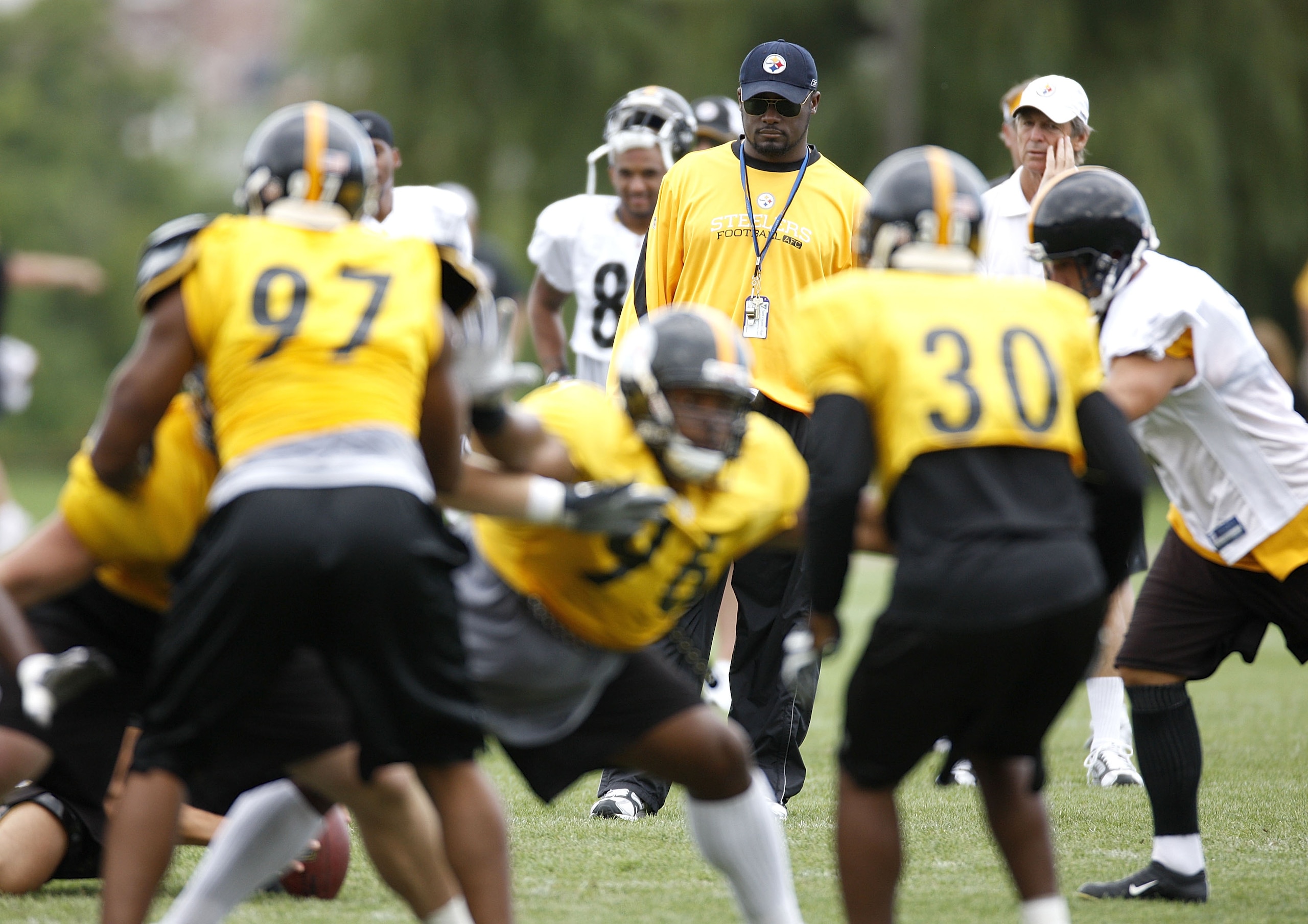 LATROBE, PA - AUGUST 06:  Head coach Mike Tomlin of the Pittsburgh Steelers looks on during training camp at St. Vincent College on August 6, 2009 in Latrobe, Pennsylvania.  (Photo by Gregory Shamus/Getty Images)