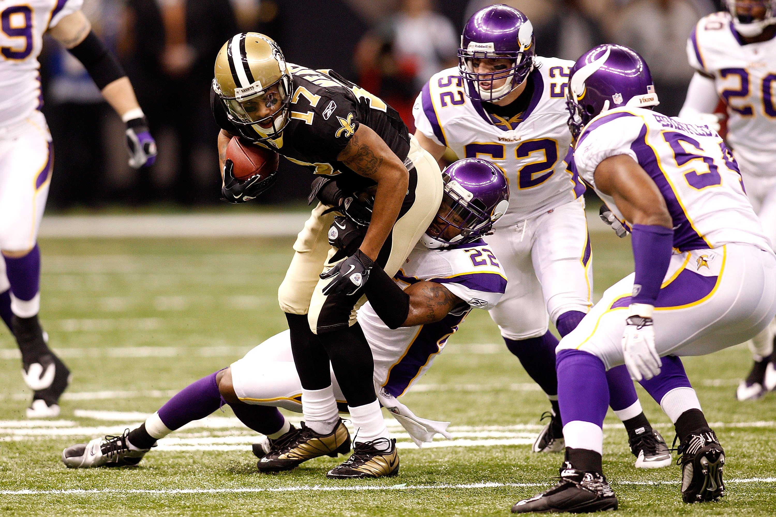 NEW ORLEANS - JANUARY 24:  Robert Meachem #17 of the New Orleans Saints looks to run for yards after the catch against the Minnesota Vikings during the NFC Championship Game at the Louisiana Superdome on January 24, 2010 in New Orleans, Louisiana. The Sai