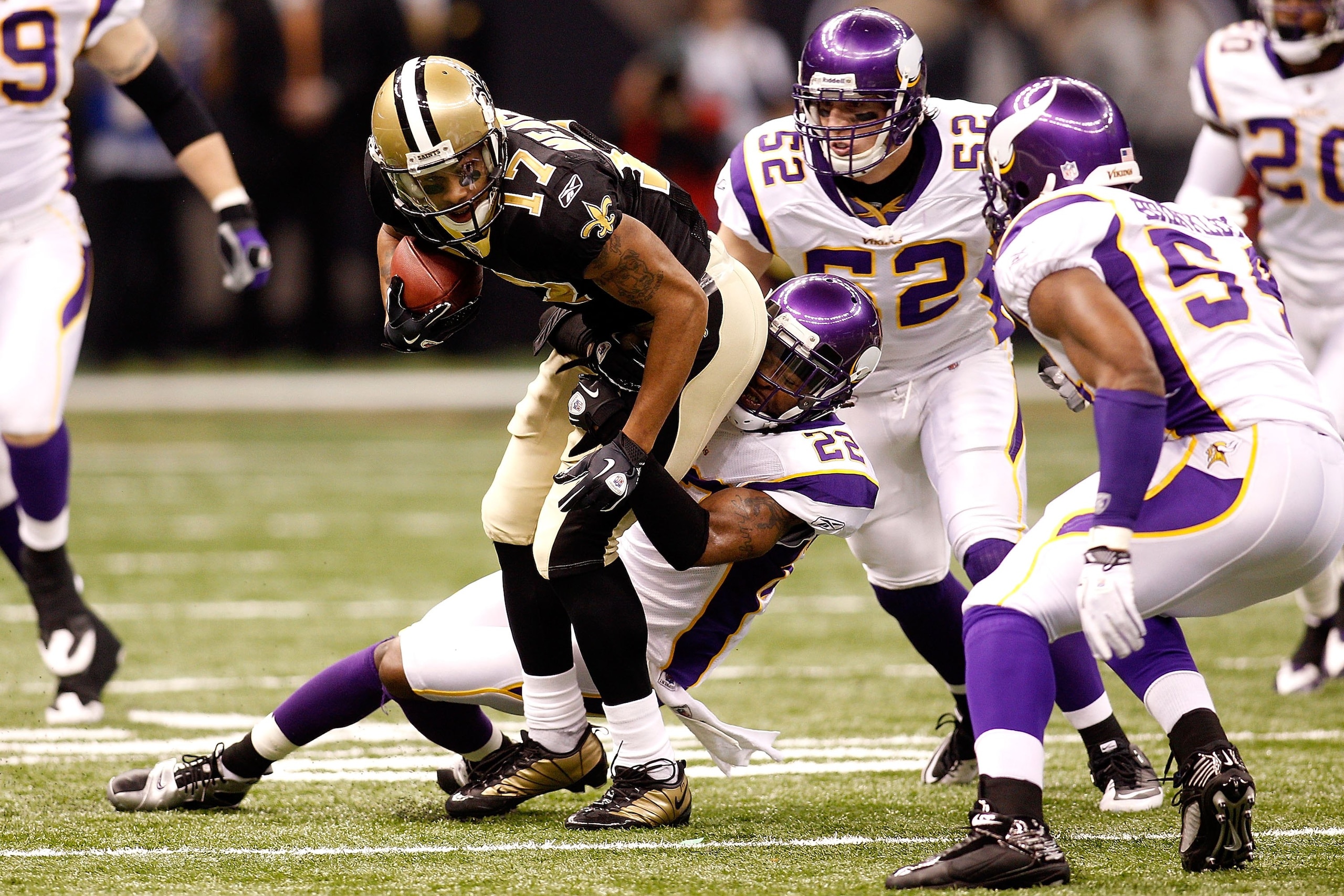 NEW ORLEANS - JANUARY 24:  Robert Meachem #17 of the New Orleans Saints looks to run for yards after the catch against the Minnesota Vikings during the NFC Championship Game at the Louisiana Superdome on January 24, 2010 in New Orleans, Louisiana. The Sai
