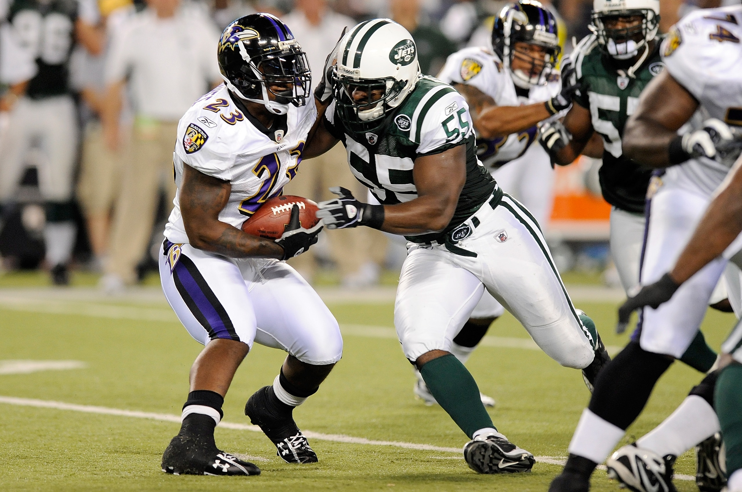 BALTIMORE - AUGUST 24:   Willis McGahee #23 of the Baltimore Ravens is tackled by Jamaal Westerman of the New York Jets during a preseason game at M&T Bank Stadium on August 24, 2009 in Baltimore, Maryland.  (Photo by Greg Fiume/Getty Images)