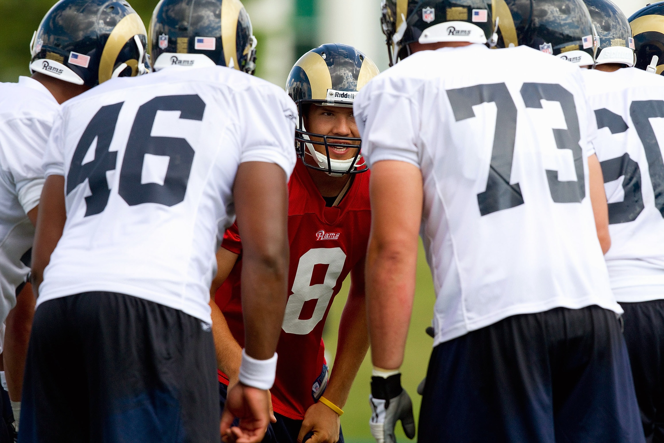 EARTH CITY, MO - JULY 31: Sam Bradford #8 of the St. Louis Rams participates in an offensive drill during training camp at the Russell Athletic Training Facility on July 31, 2010 in Earth City, Missouri.  (Photo by Dilip Vishwanat/Getty Images)