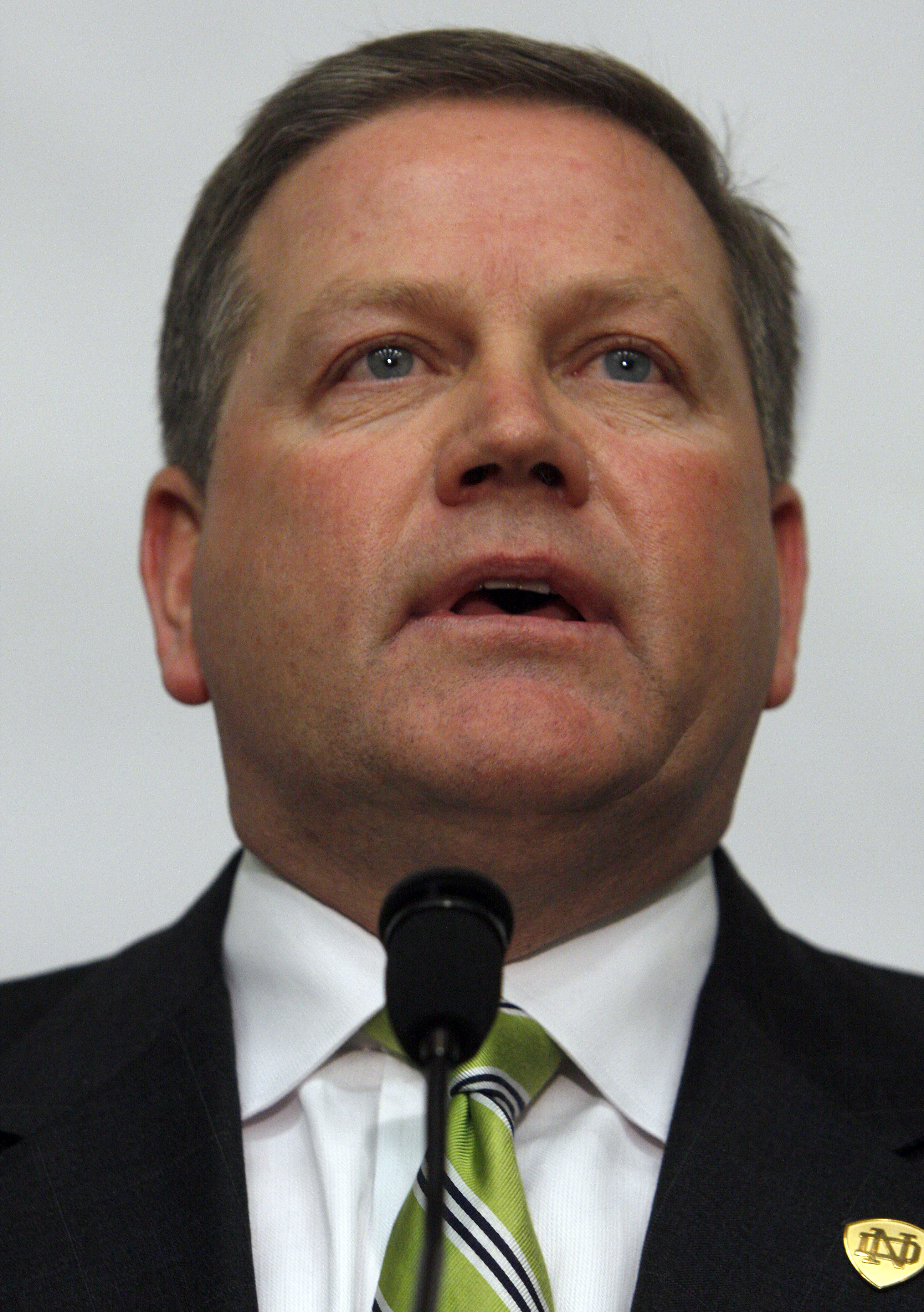 SOUTH BEND, IN - DECEMBER 11: Brian Kelly speaks to the media at a news conference after being named new football head coach at Notre Dame University on December 11, 2009 in South Bend, Indiana.  Kelly most recently led the University of Cincinnati to two