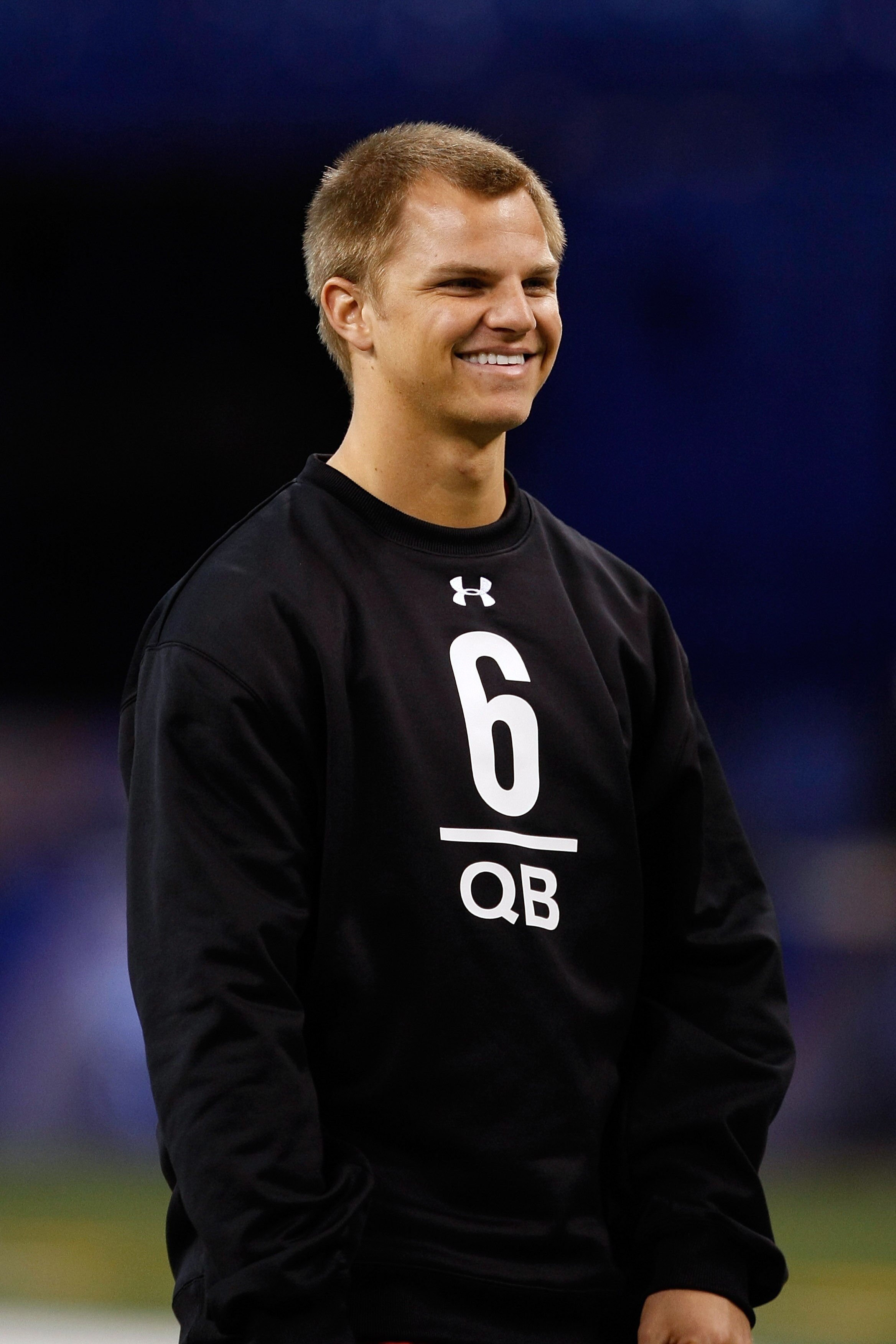 INDIANAPOLIS, IN - FEBRUARY 28: Quarterback Jimmy Clausen of Notre Dame watches drills after deciding not to participate  during the NFL Scouting Combine presented by Under Armour at Lucas Oil Stadium on February 28, 2010 in Indianapolis, Indiana. (Photo